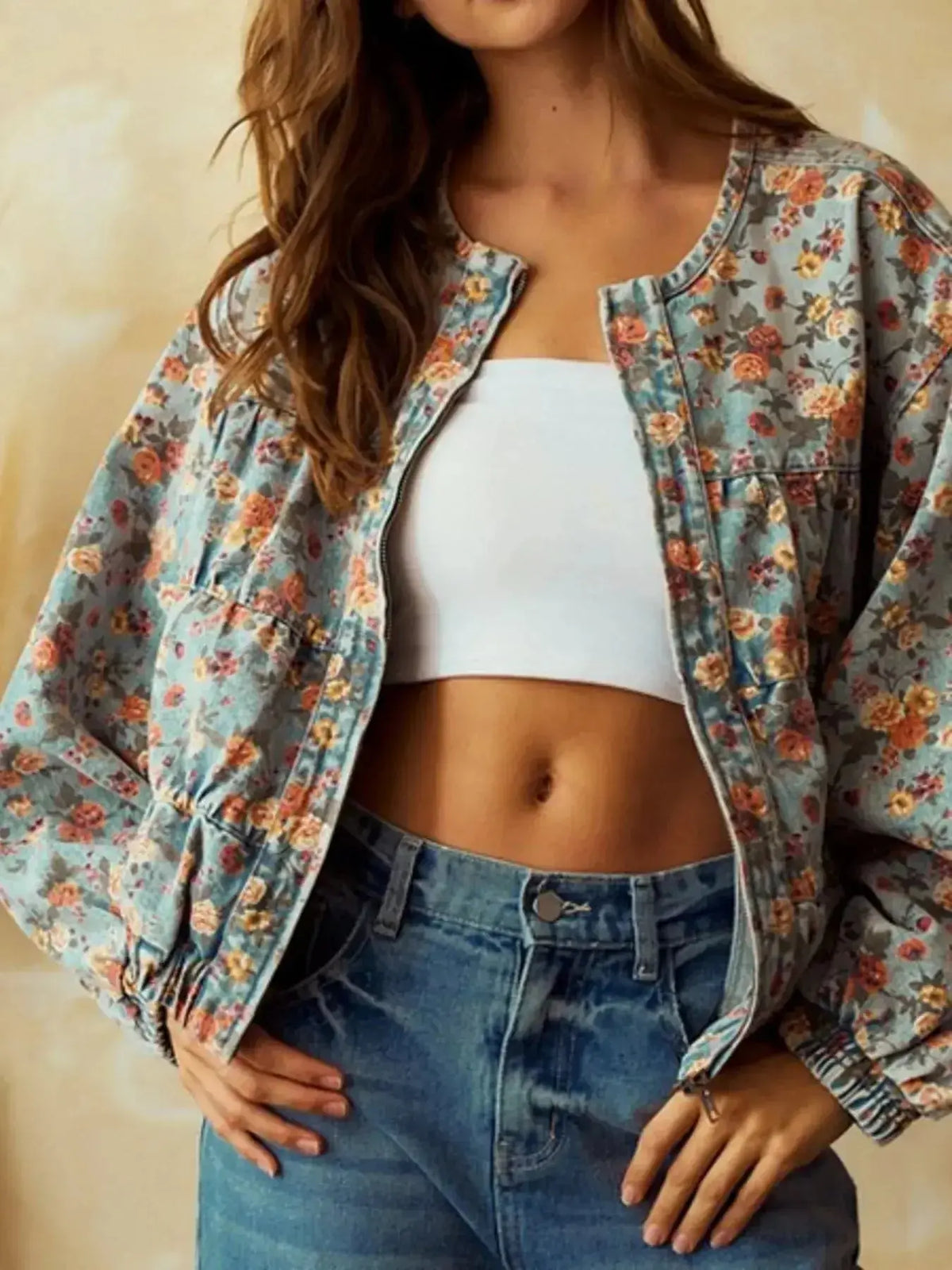 Women's floral print cropped denim utility jacket by Plush Fashion Hub, featuring a zip-up front and cotton blend fabric.