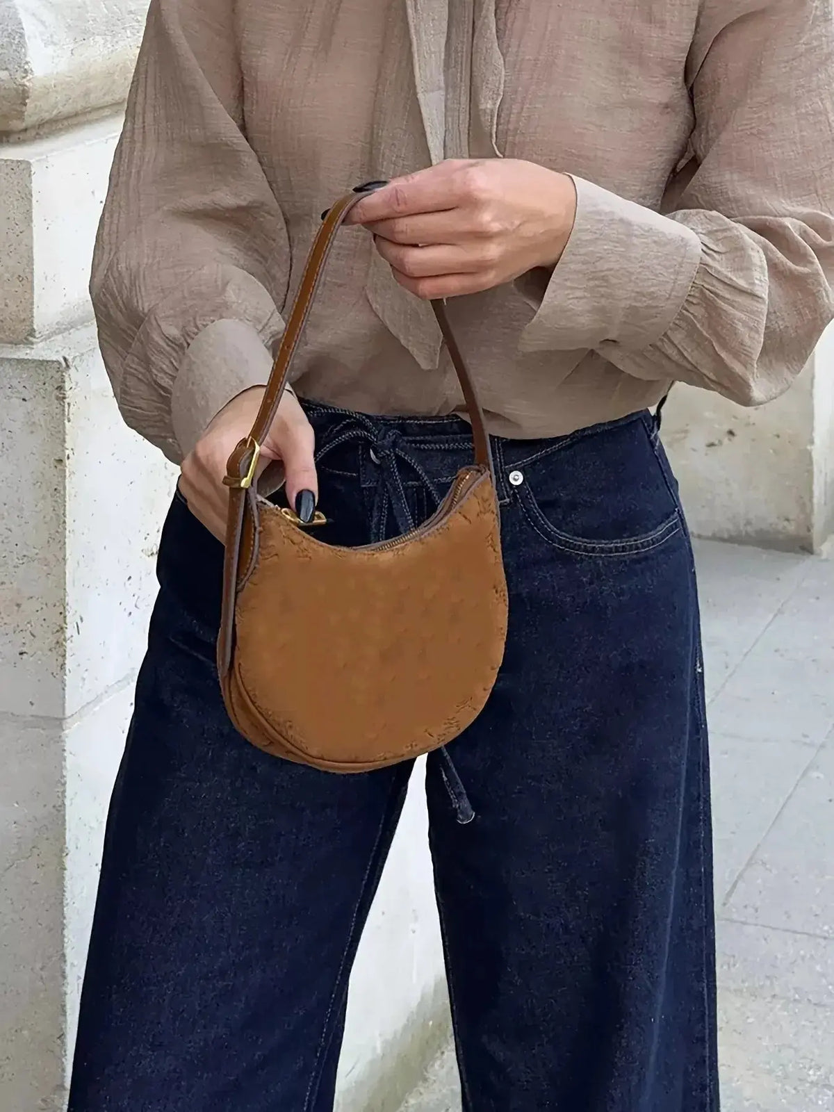 Women’s high-waisted flare jeans by Plush Fashion Hub featuring a relaxed fit, tied waist, and loose denim style.