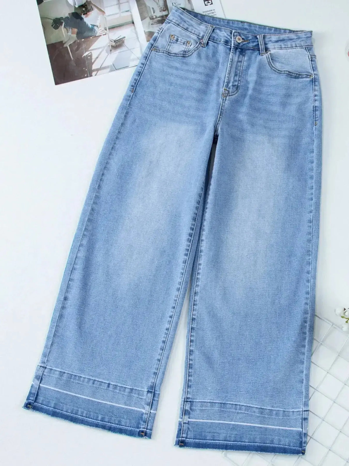 Women’s high-waisted wide-leg washed denim jeans by Plush Fashion Hub, showcasing relaxed fit and classic style.