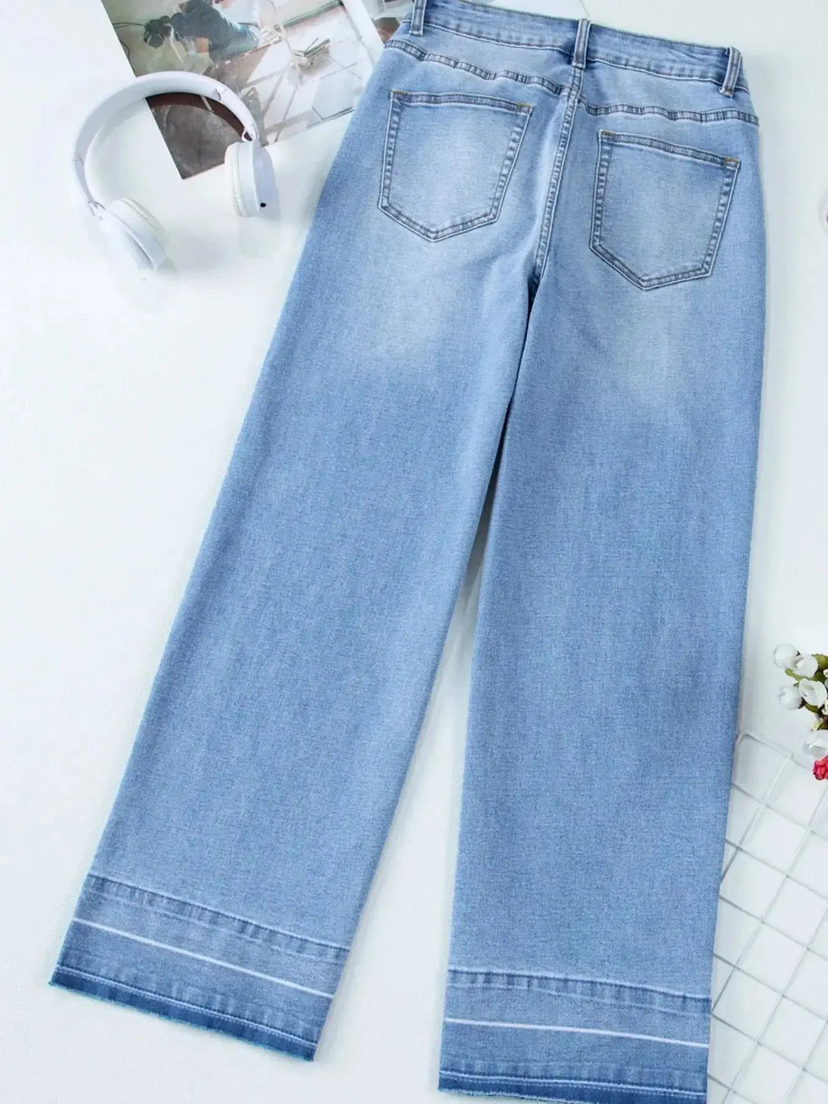 Women’s high-waisted wide-leg washed denim jeans by Plush Fashion Hub, featuring a relaxed fit and trendy casual style.