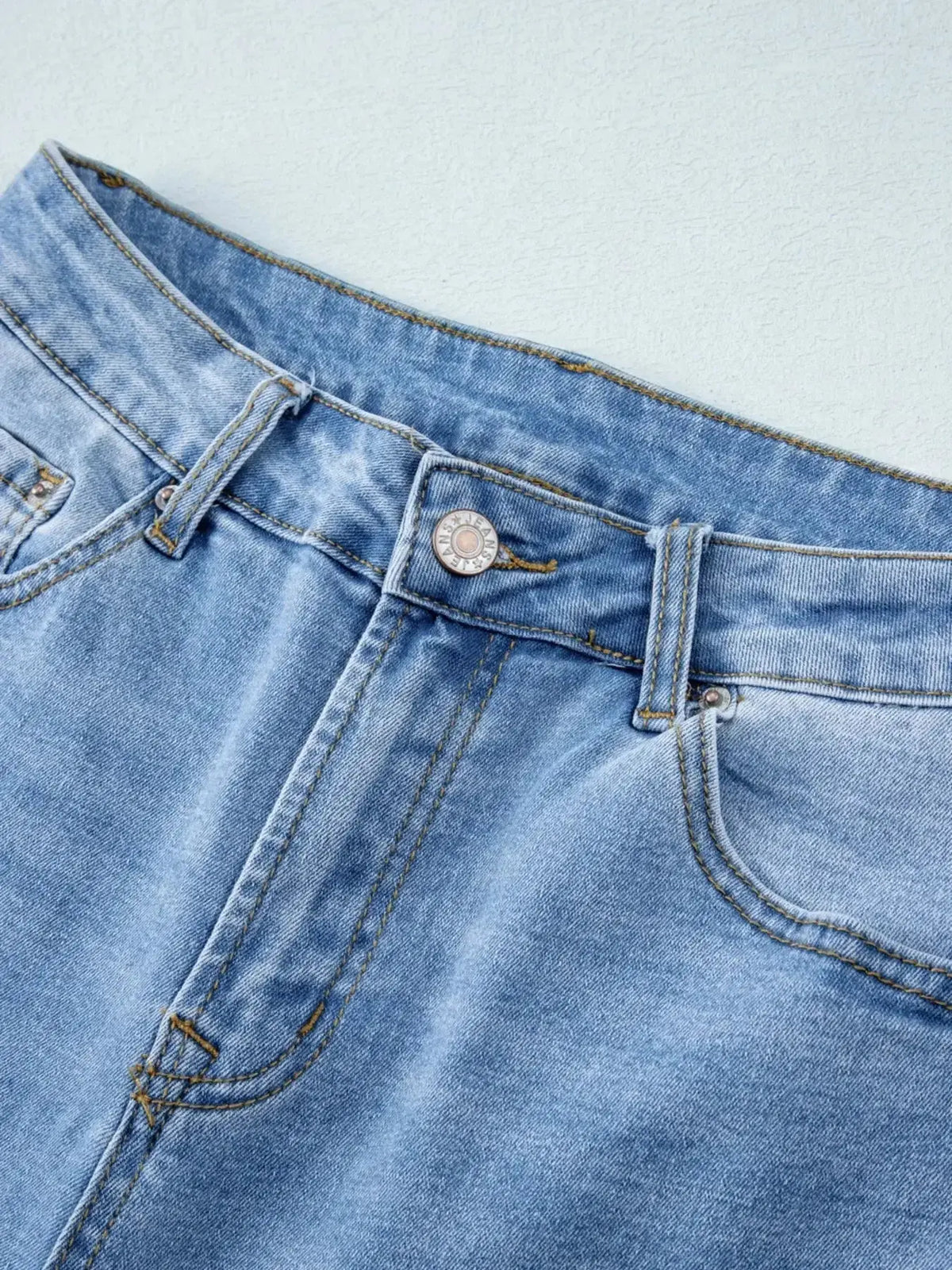 Women’s high-waisted wide-leg washed denim jeans by Plush Fashion Hub, featuring a relaxed fit and classic style.