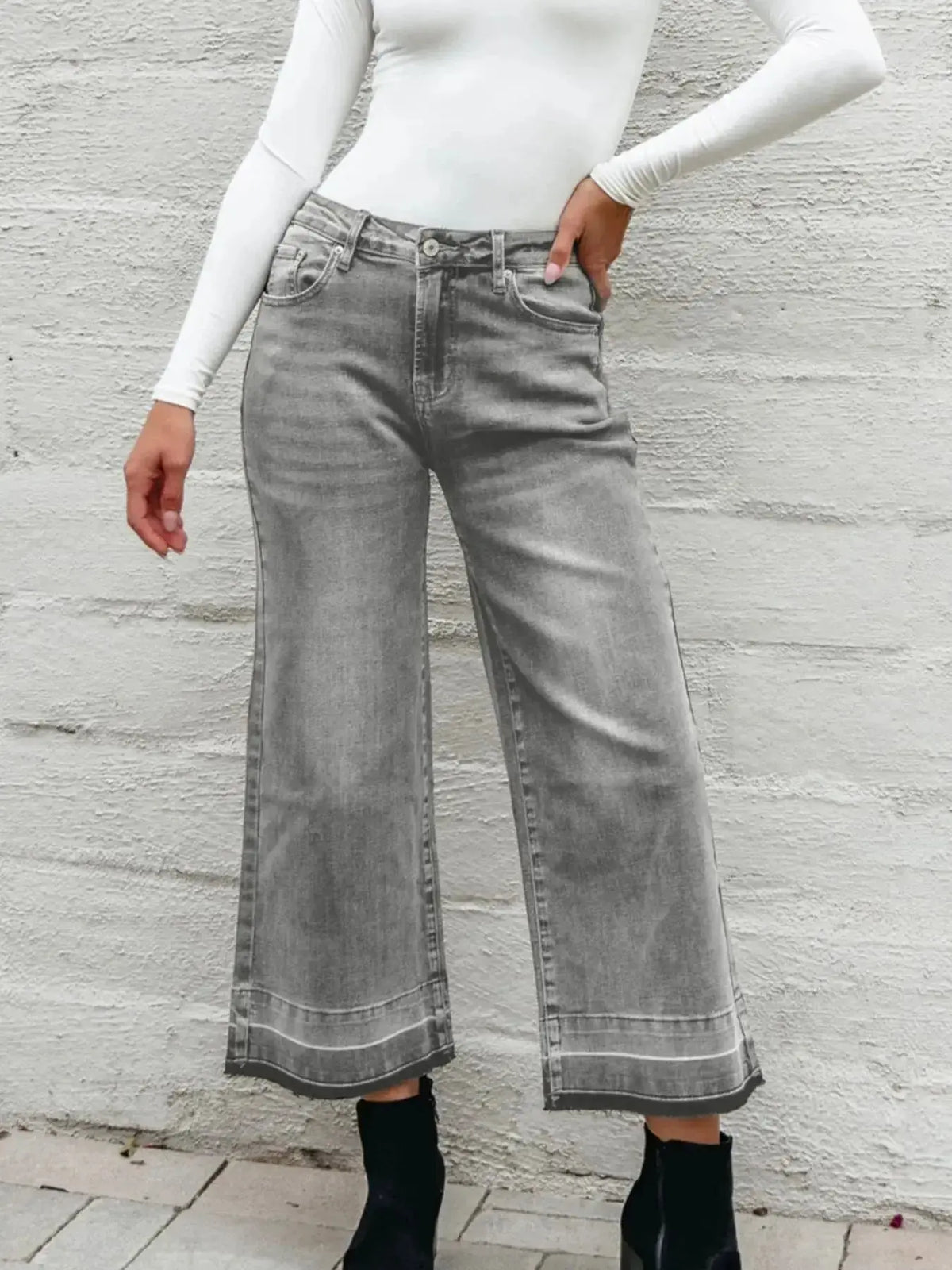 Women’s high-waisted wide-leg washed denim jeans by Plush Fashion Hub, featuring a relaxed fit and casual style.