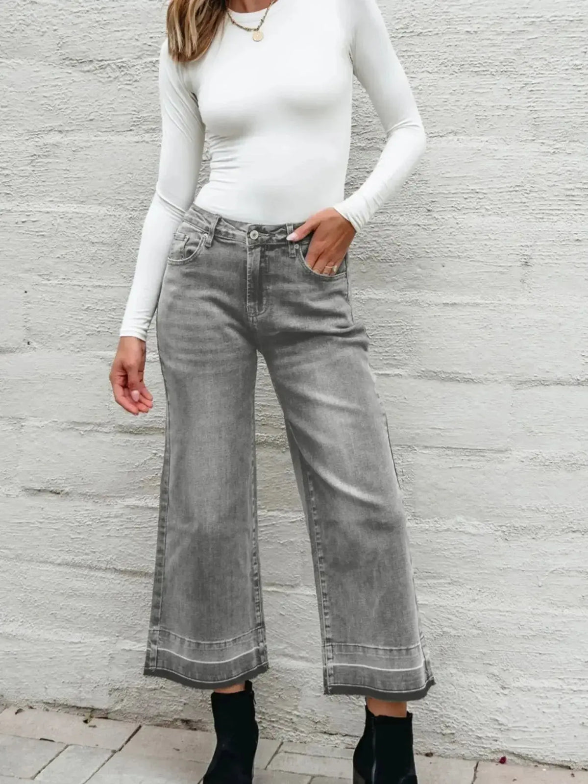 Women’s high-waisted wide-leg washed denim jeans by Plush Fashion Hub, featuring a relaxed fit and classic style.