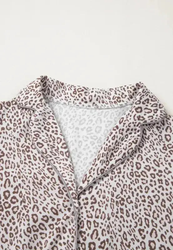 Women’s leopard print long sleeve button-down pajama lounge set by Plush Fashion Hub, featuring comfortable, stylish sleepwear with a button-up top.