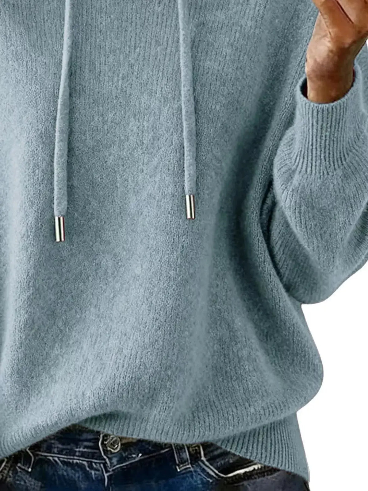 Women’s long sleeve drawstring hooded sweater by Plush Fashion Hub, cozy casual pullover with a relaxed fit and comfortable design.