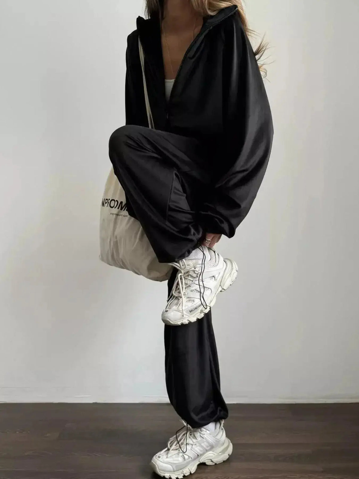 Women’s long sleeve zip-up jacket and pants lounge set by Plush Fashion Hub, stylish and comfortable activewear.