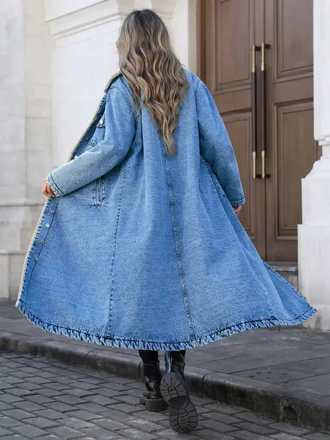 Women’s longline denim jacket with cozy sherpa lining, stylish fall and winter outerwear by Plush Fashion Hub.