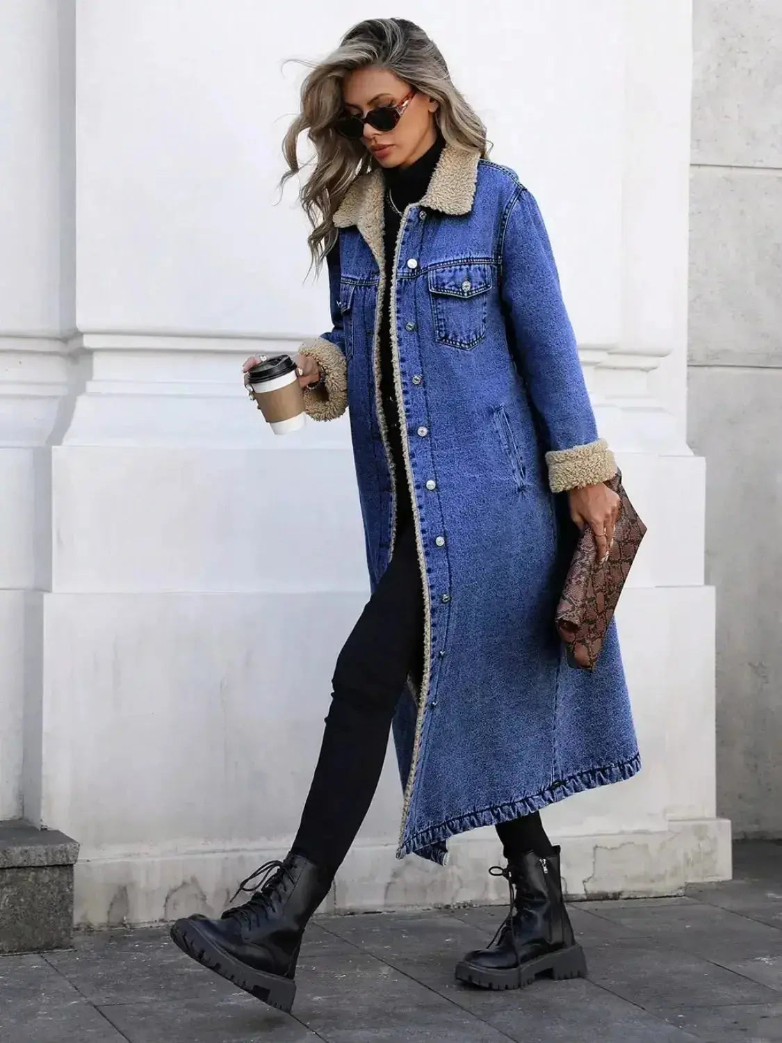Women’s longline denim jacket with plush sherpa lining, cozy fall and winter outerwear by Plush Fashion Hub.