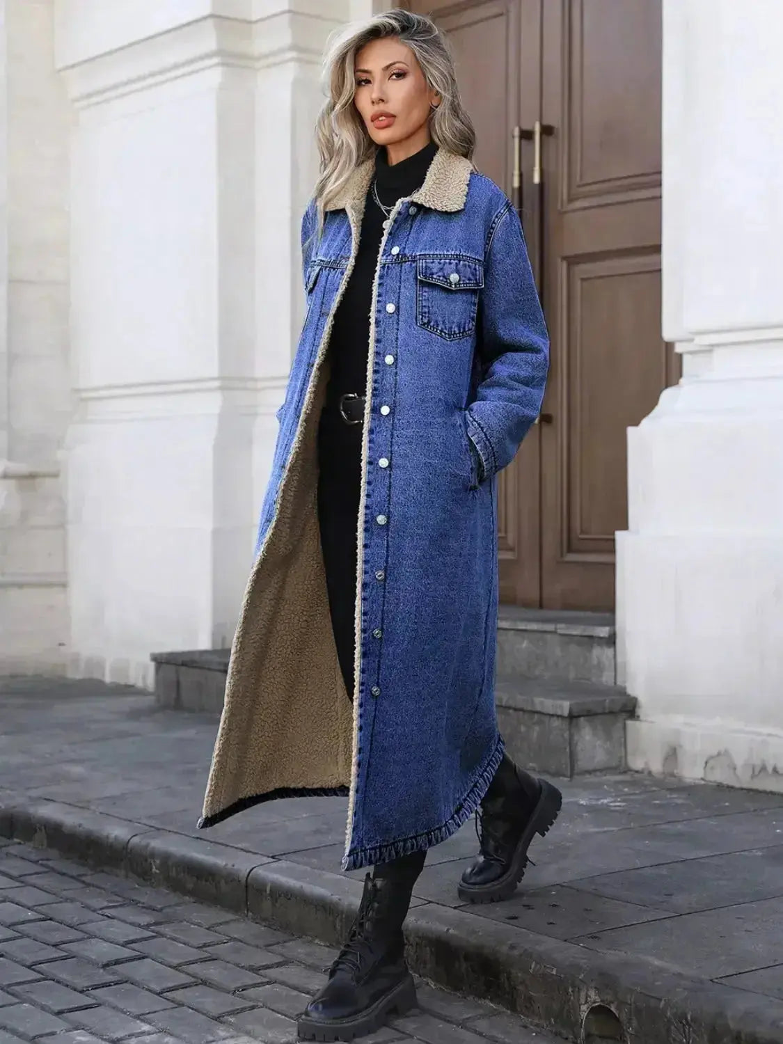 Women’s longline denim jacket with plush sherpa lining, cozy fall and winter outerwear from Plush Fashion Hub.