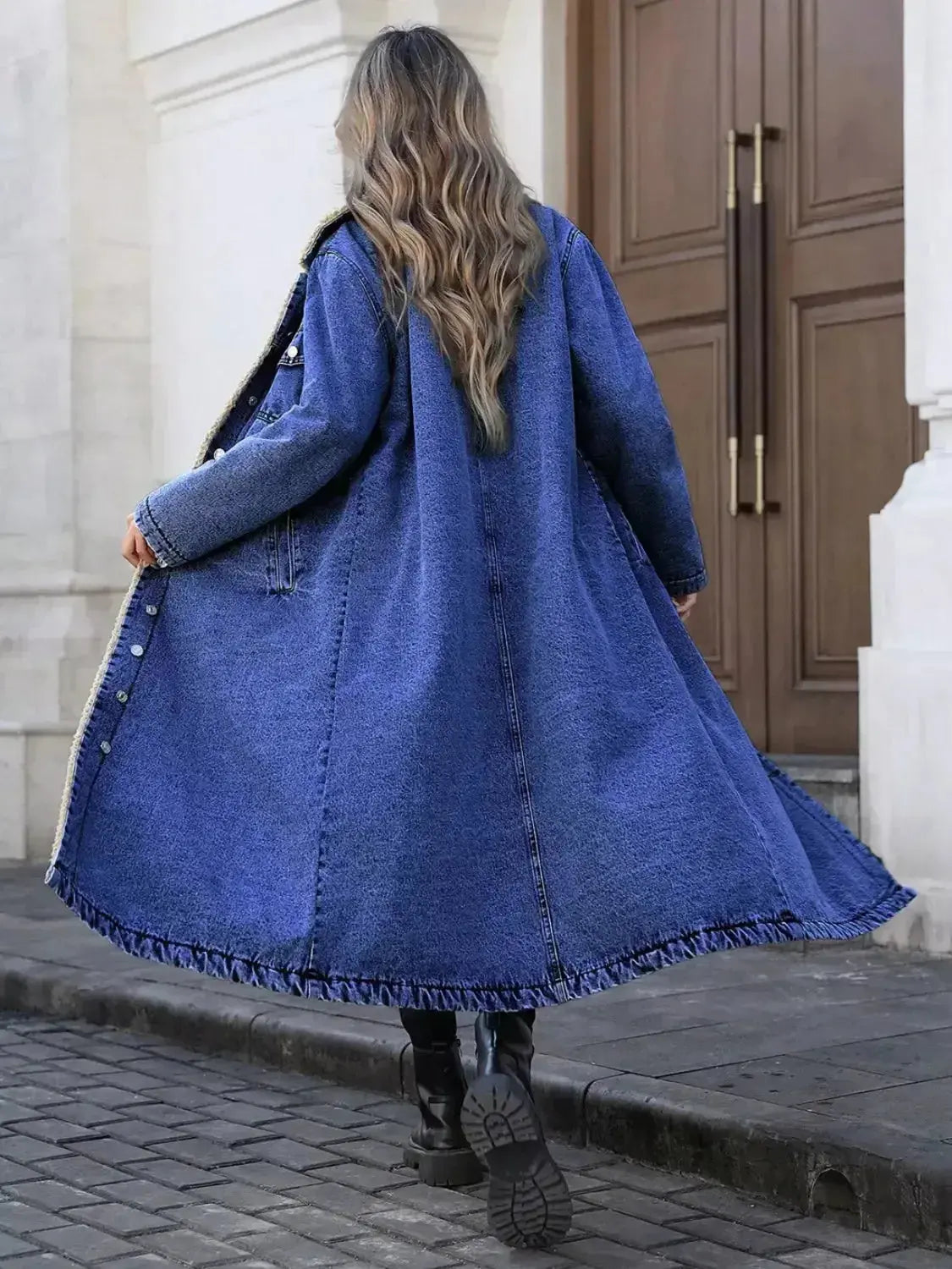 Women’s longline denim jacket with sherpa lining, cozy fall and winter outerwear by Plush Fashion Hub.