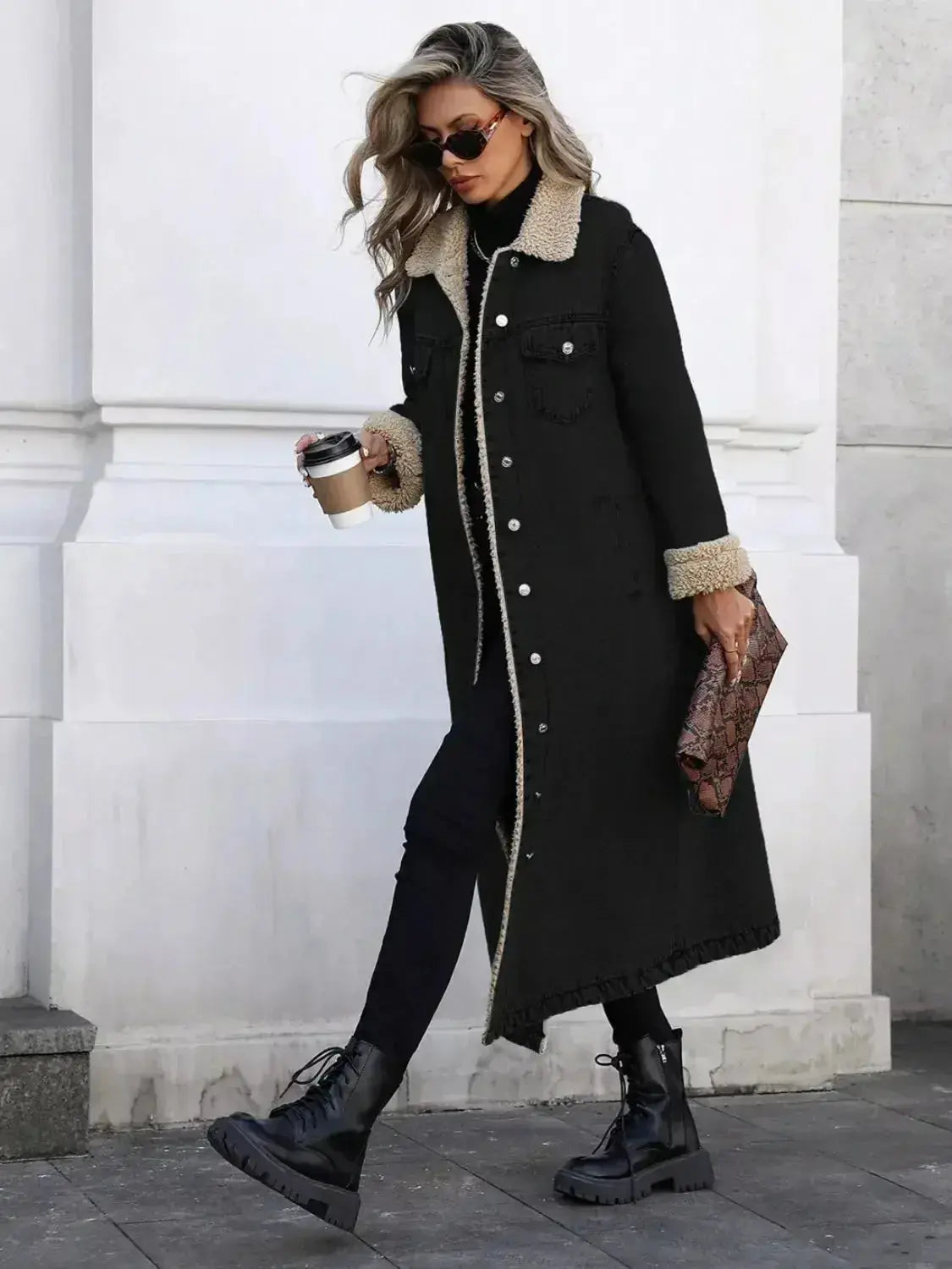 Women's longline denim jacket with sherpa lining, cozy fall and winter outerwear by Plush Fashion Hub.