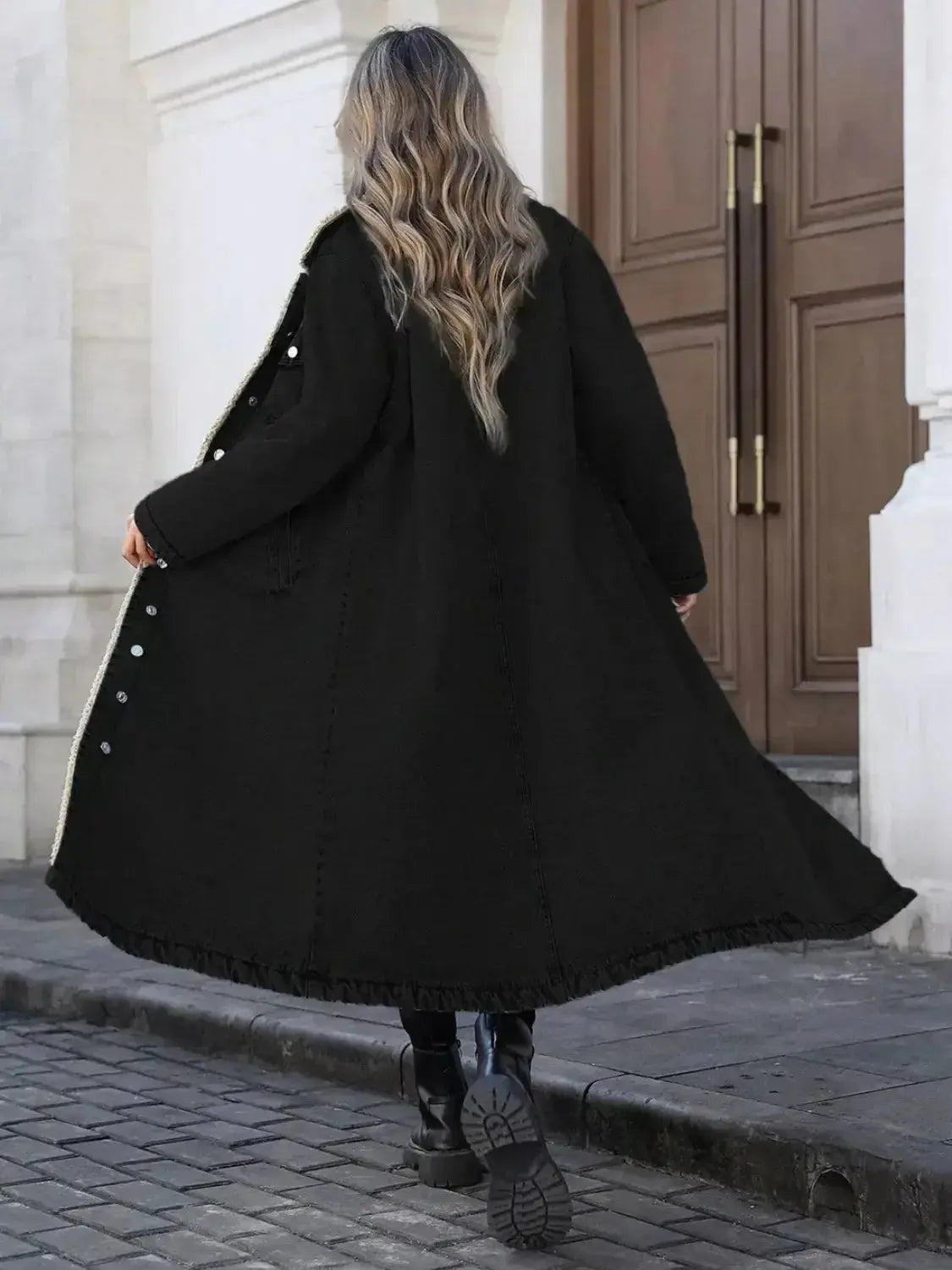 Women’s longline denim jacket with plush sherpa lining, cozy fall and winter outerwear by Plush Fashion Hub.