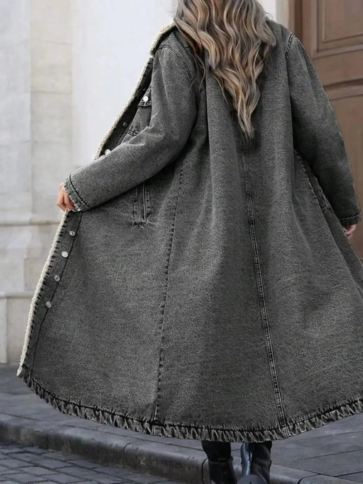 Women’s longline denim jacket with cozy sherpa lining, plush fashion hub outerwear perfect for fall and winter.