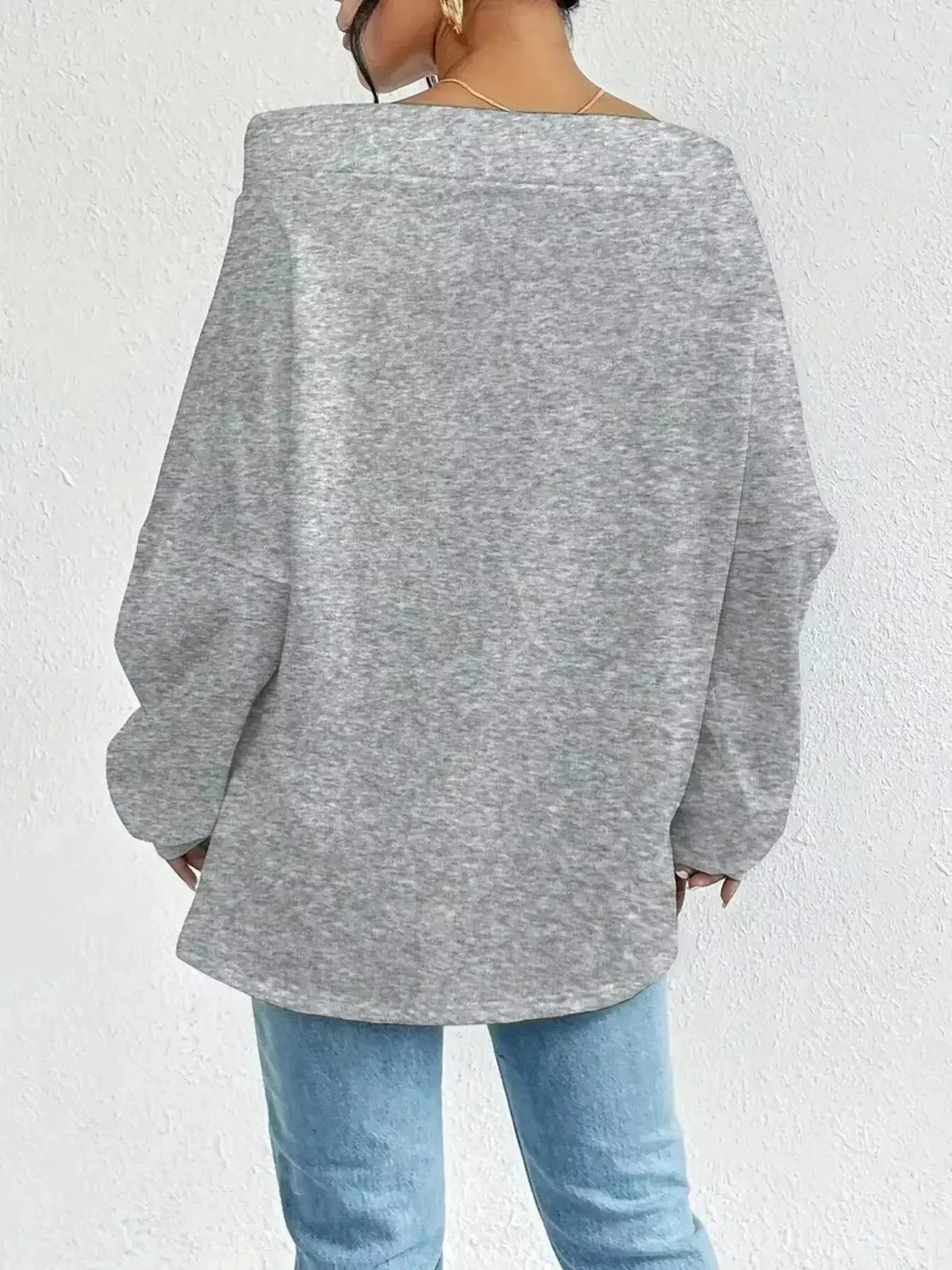 Women wearing Plush Fashion Hub off-shoulder long sleeve drawstring sweatshirt, stylish and comfortable casual wear.
