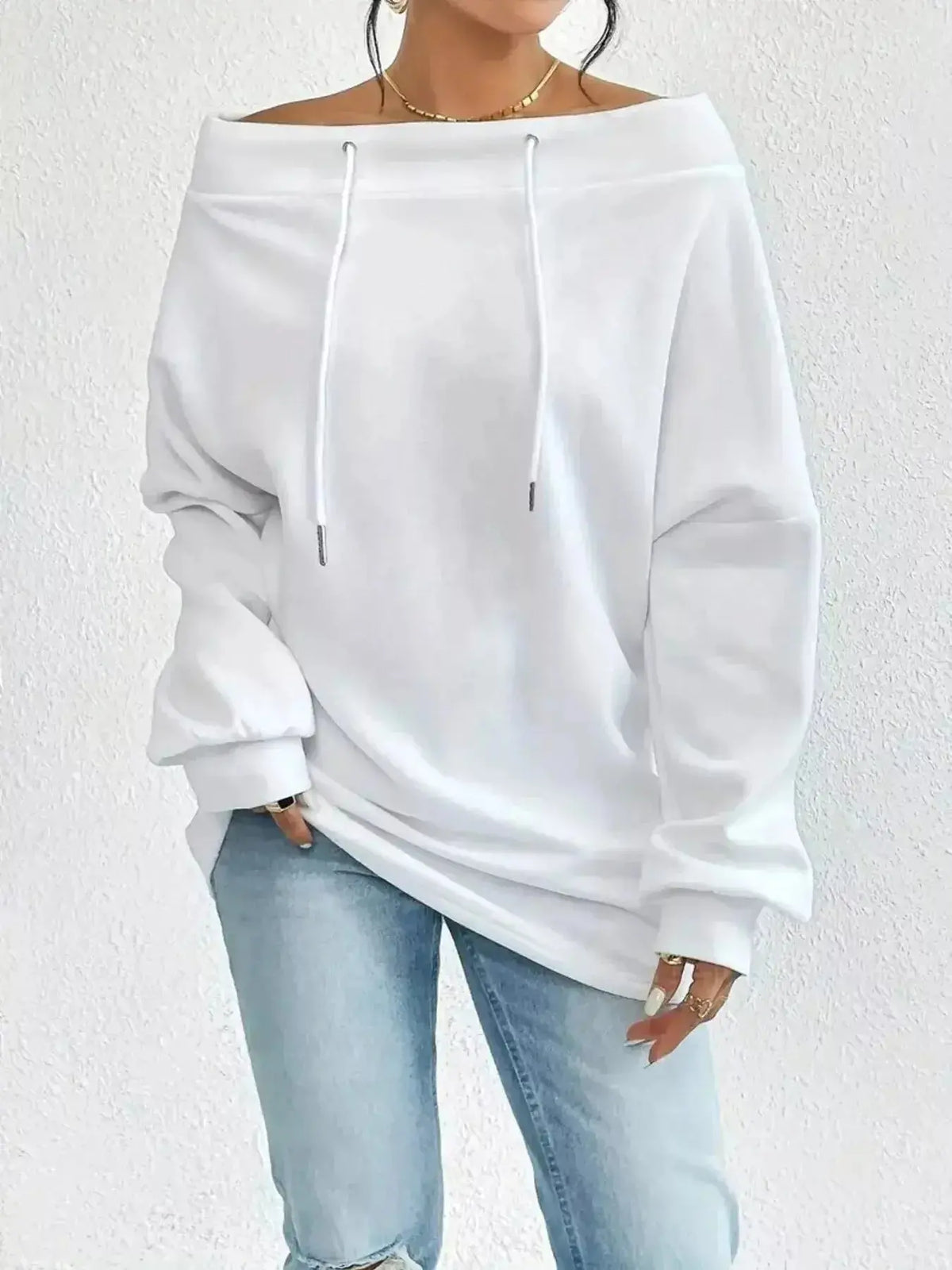 Women’s off-shoulder long sleeve sweatshirt with drawstring details from Plush Fashion Hub, casual and stylish for everyday wear.