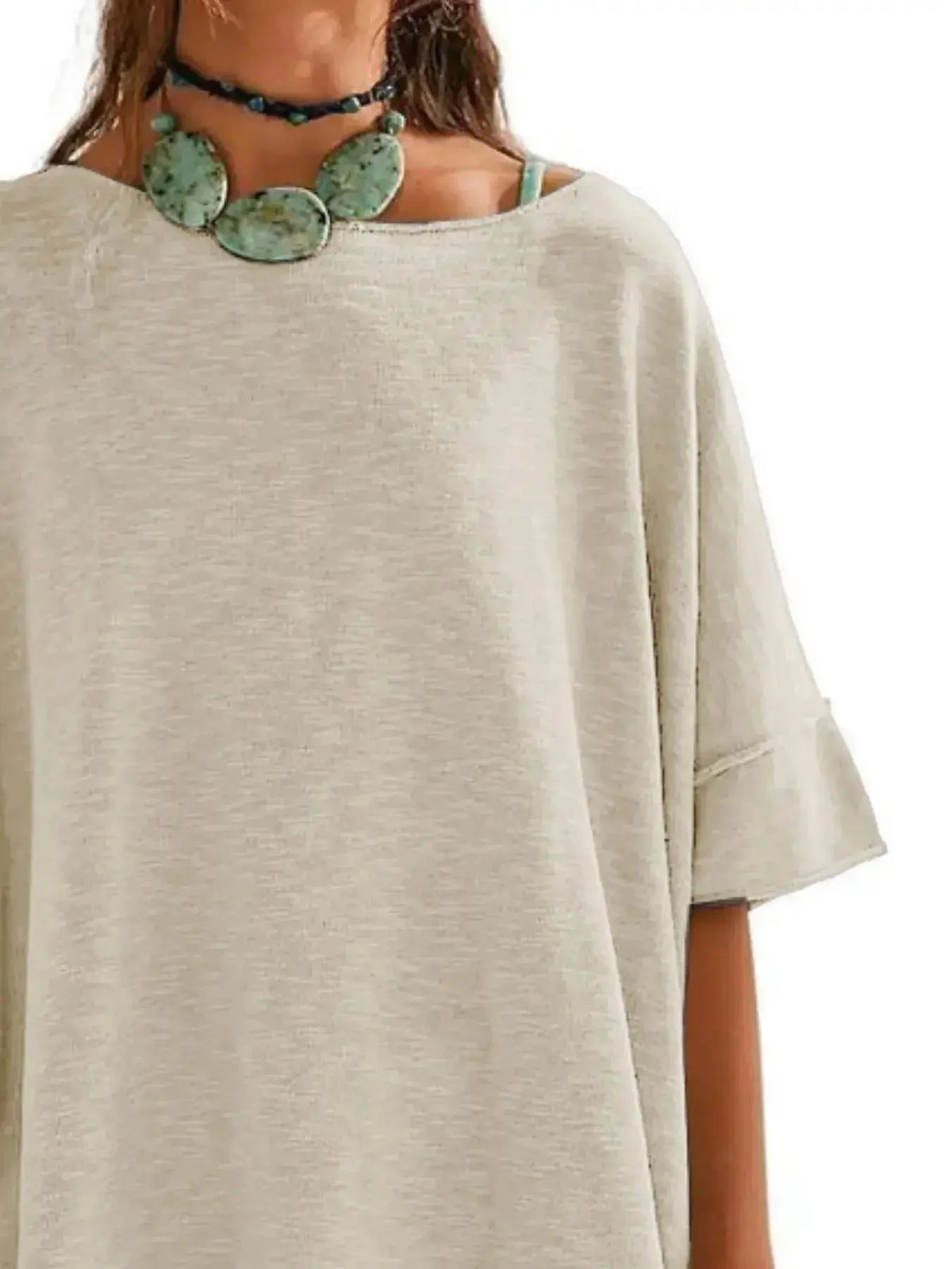 Women’s oversized drop-shoulder round neck casual T-shirt by Plush Fashion Hub, relaxed fit with soft fabric and stylish design.
