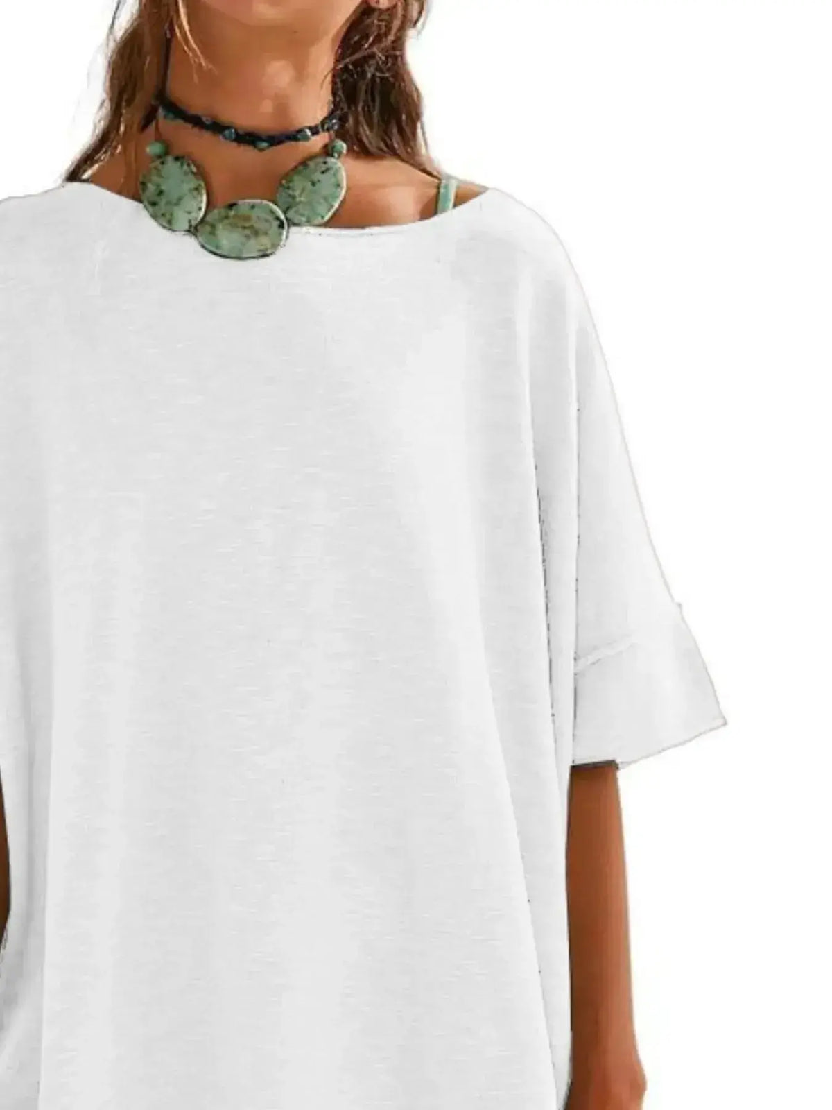 Women’s oversized drop-shoulder round neck casual T-shirt by Plush Fashion Hub, relaxed fit with soft fabric and trendy style.