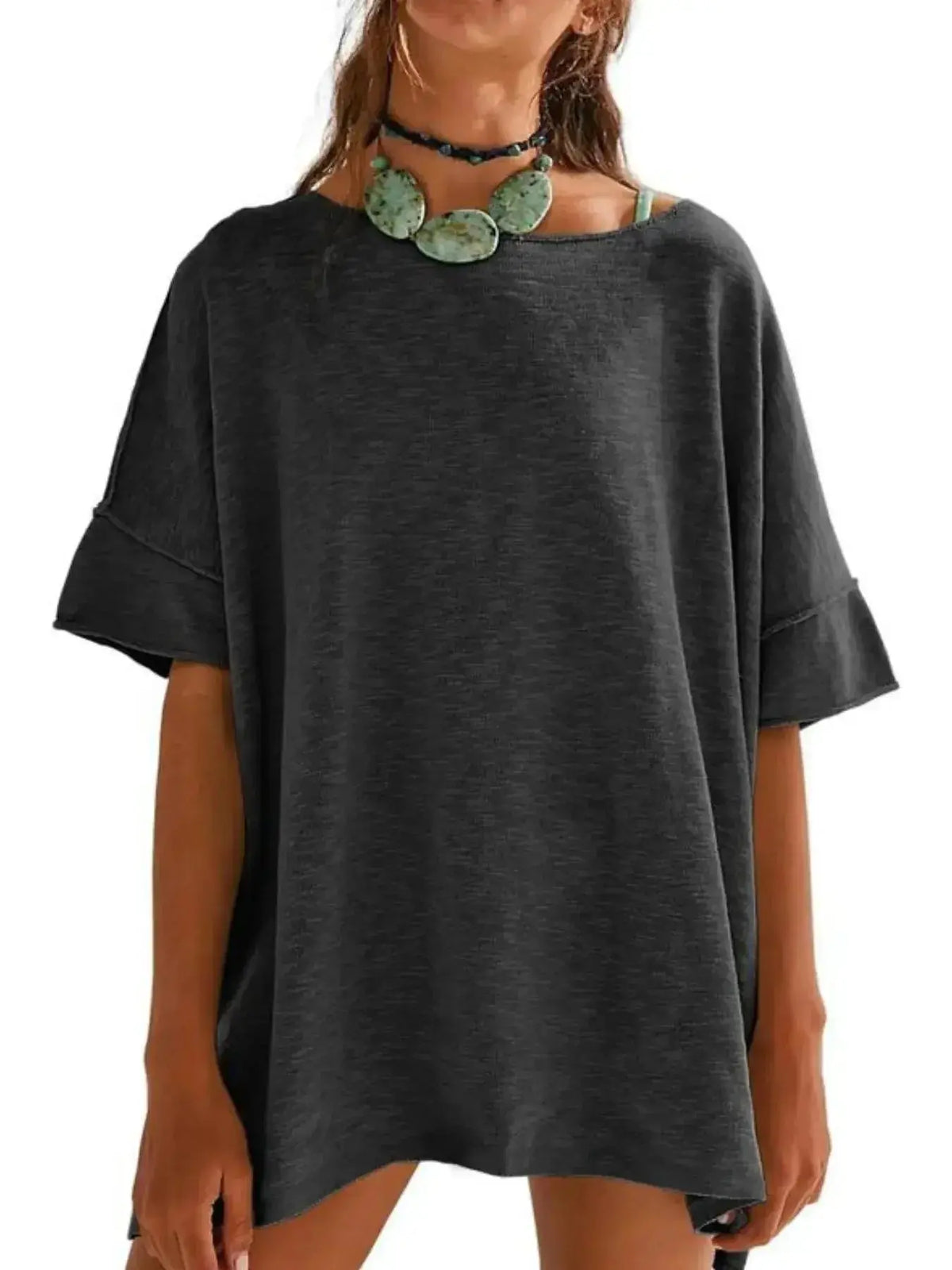 Women wearing Plush Fashion Hub oversized drop-shoulder round neck casual T-shirt, relaxed fit and comfortable for everyday wear.
