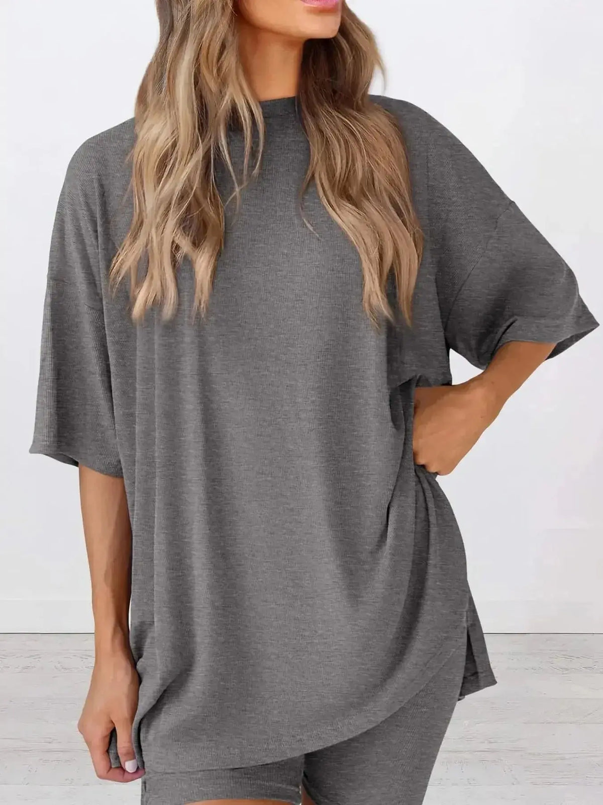 Women's oversized round neck lounge shirt from Plush Fashion Hub, part of a comfy two-piece loungewear set, casual and relaxed fit.