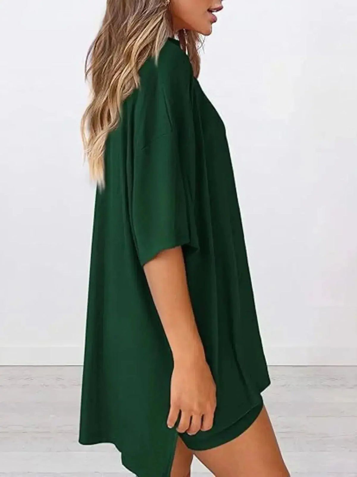 Women’s oversized round neck loungewear set by Plush Fashion Hub, featuring a comfortable two-piece shirt and lounge pants.
