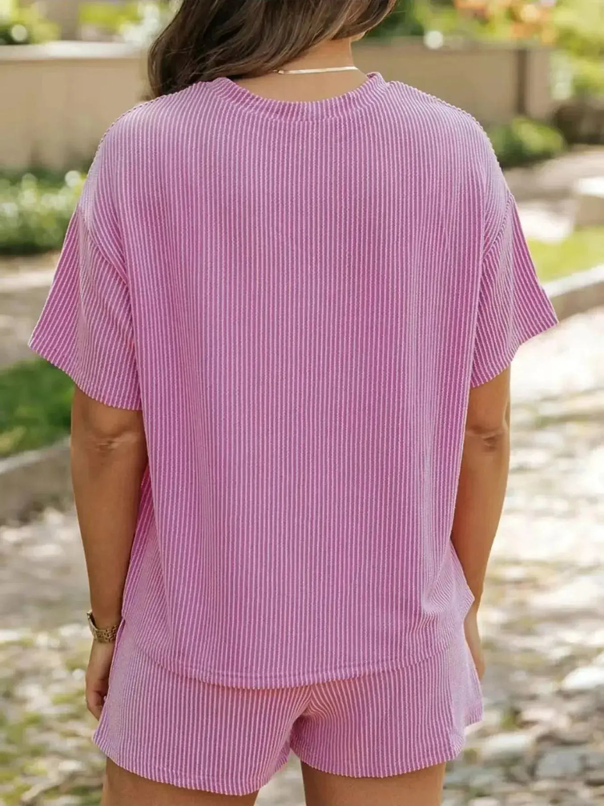 Plus size women's ribbed short sleeve pajama top and shorts lounge set by Plush Fashion Hub, comfortable and stylish sleepwear.