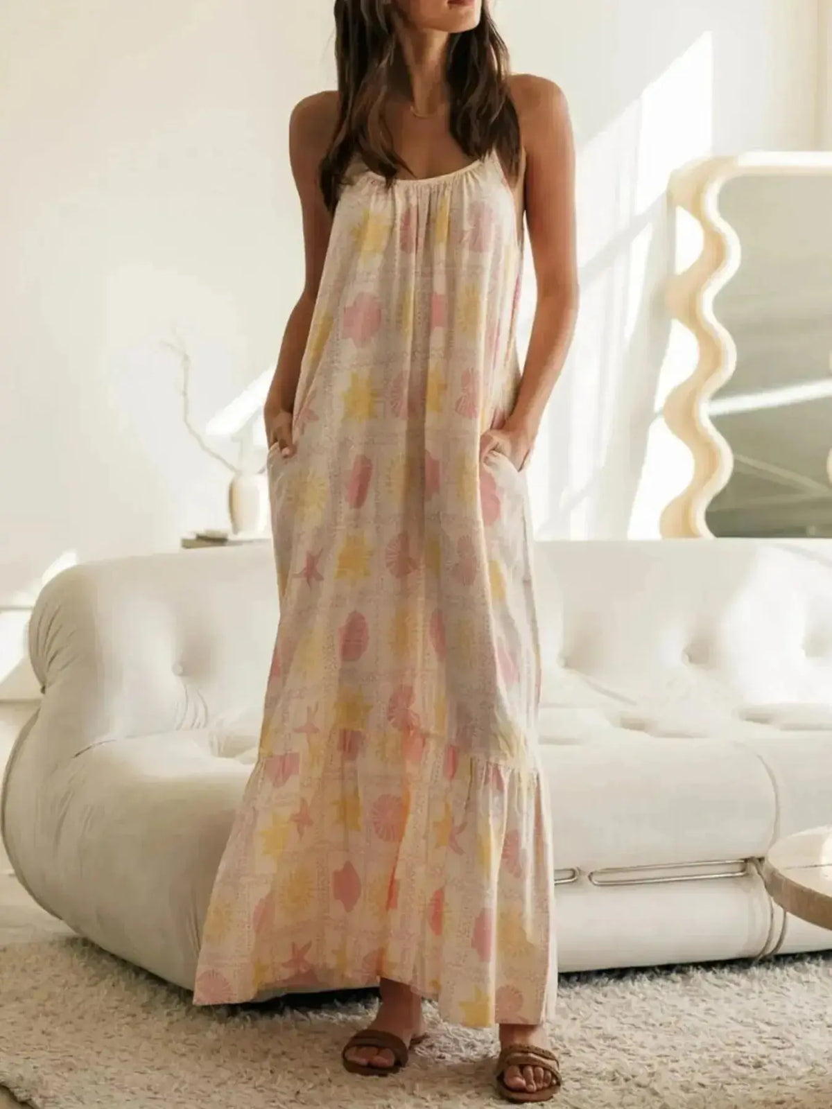 Women’s printed maxi lounge dress with ruffled hem and pockets, stylish pajamas by Plush Fashion Hub.