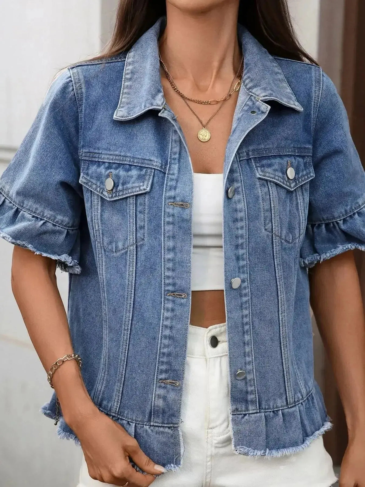 Women’s ruffled raw hem denim jacket by Plush Fashion Hub featuring button-up front and stylish distressed details.