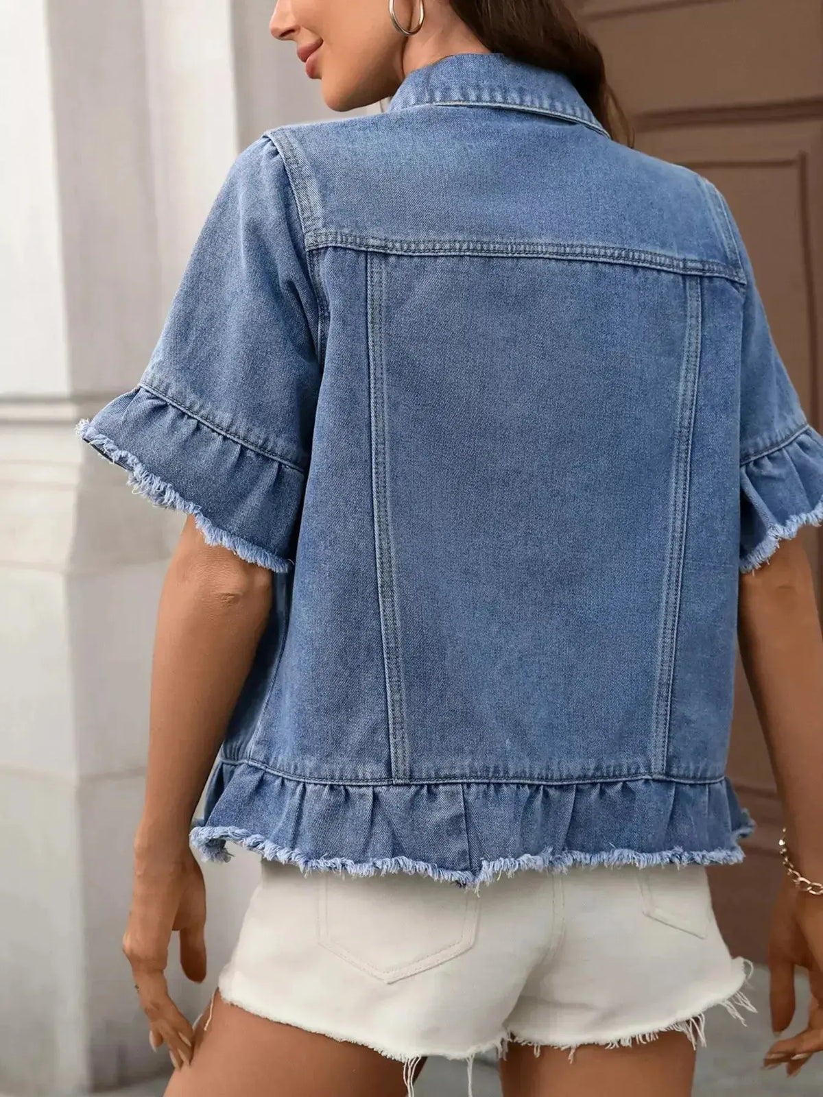 Women’s ruffled raw hem denim jacket by Plush Fashion Hub featuring button-up front and stylish distressed design.