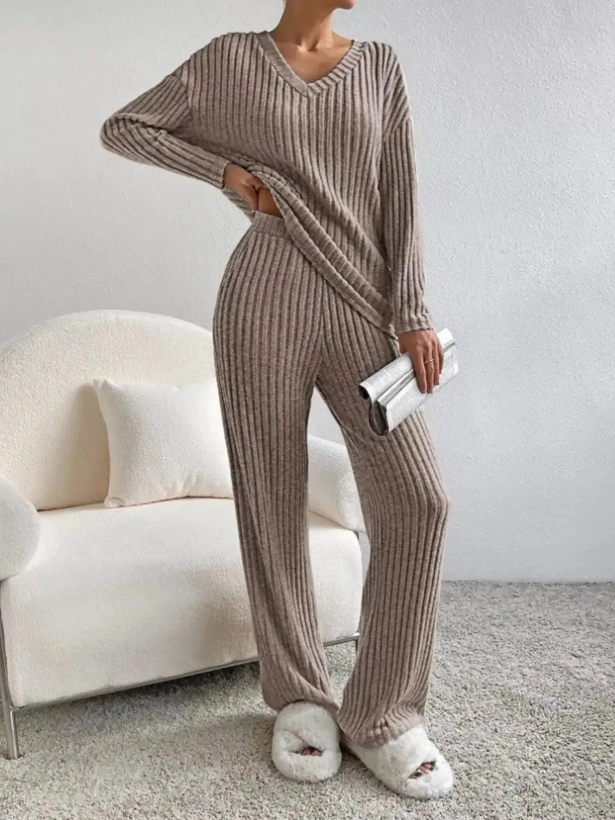 Women’s ribbed knit V-neck lounge set by Plush Fashion Hub, two-piece comfortable matching pant set for relaxing wear.