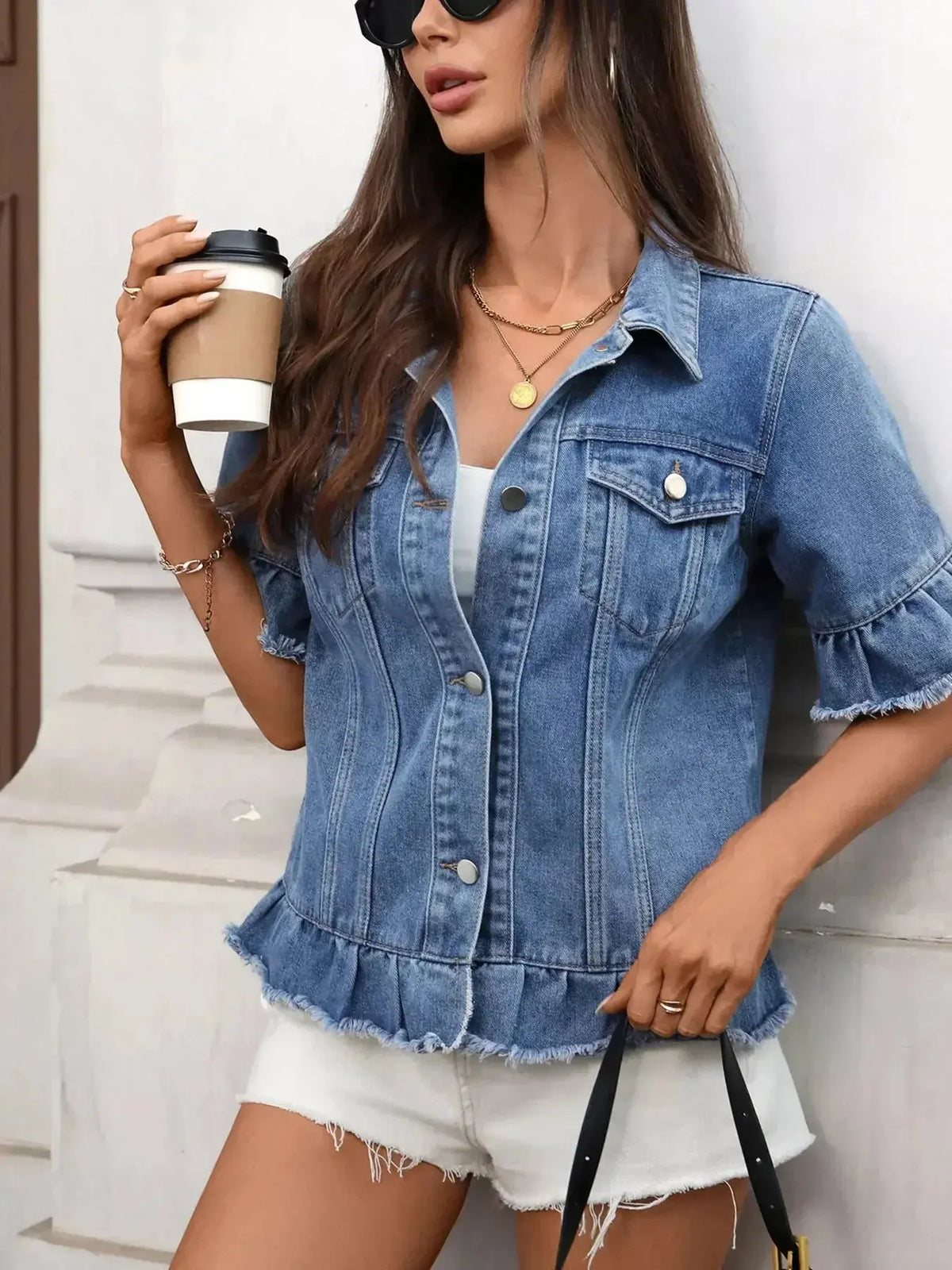 Women’s ruffled raw hem denim jacket by Plush Fashion Hub, featuring button-up front and stylish ruffle details.
