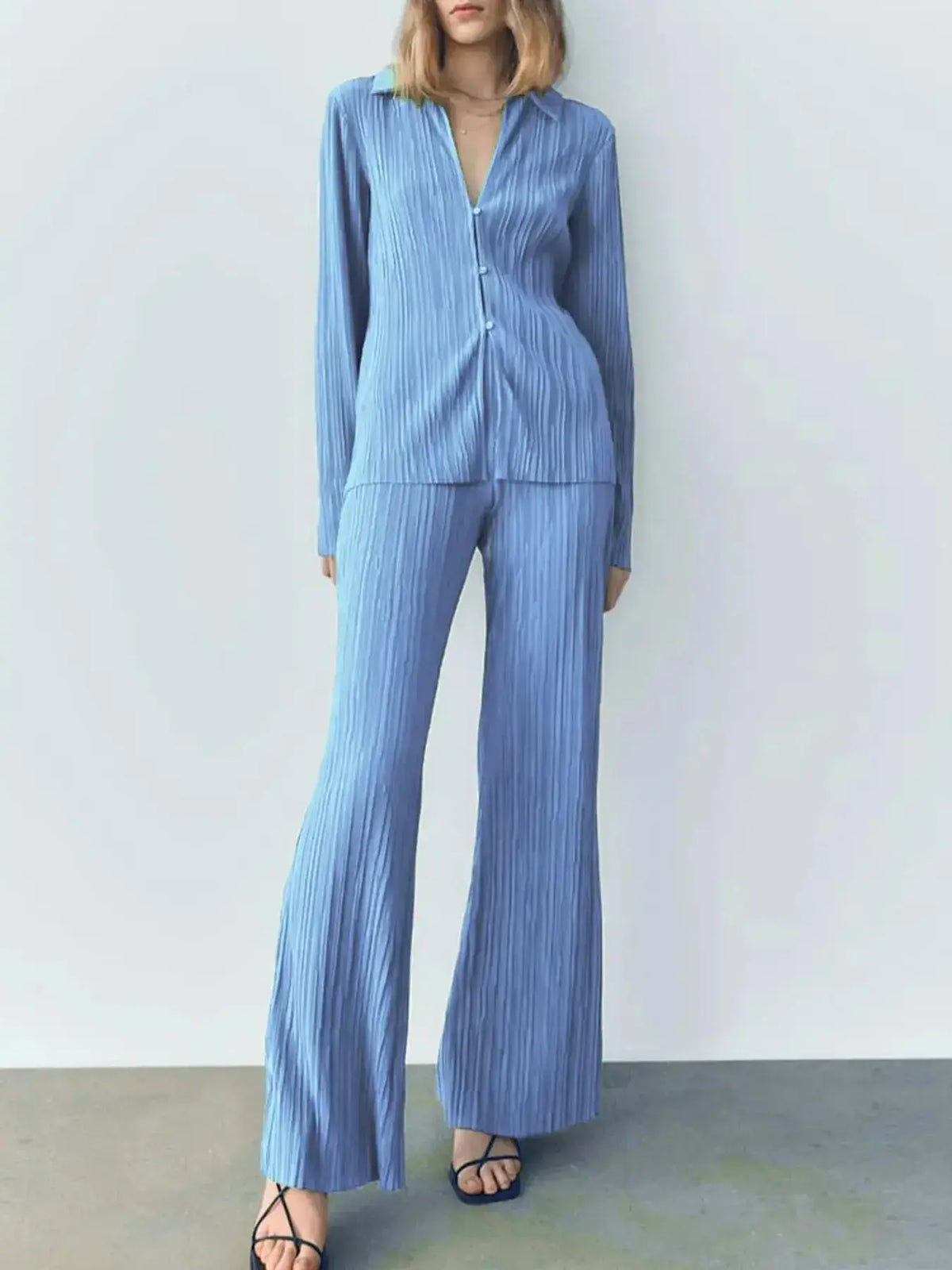 Women’s textured long sleeve button-up lounge set pajamas by Plush Fashion Hub, cozy two-piece sleepwear for relaxed nights.
