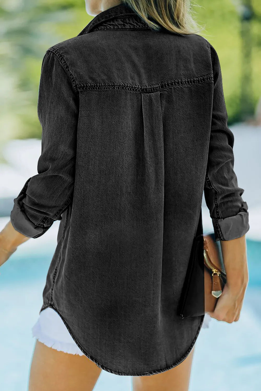 Trendsi denim top with long sleeves, collared neck, and front pockets, showcasing casual style and classic denim fabric.
