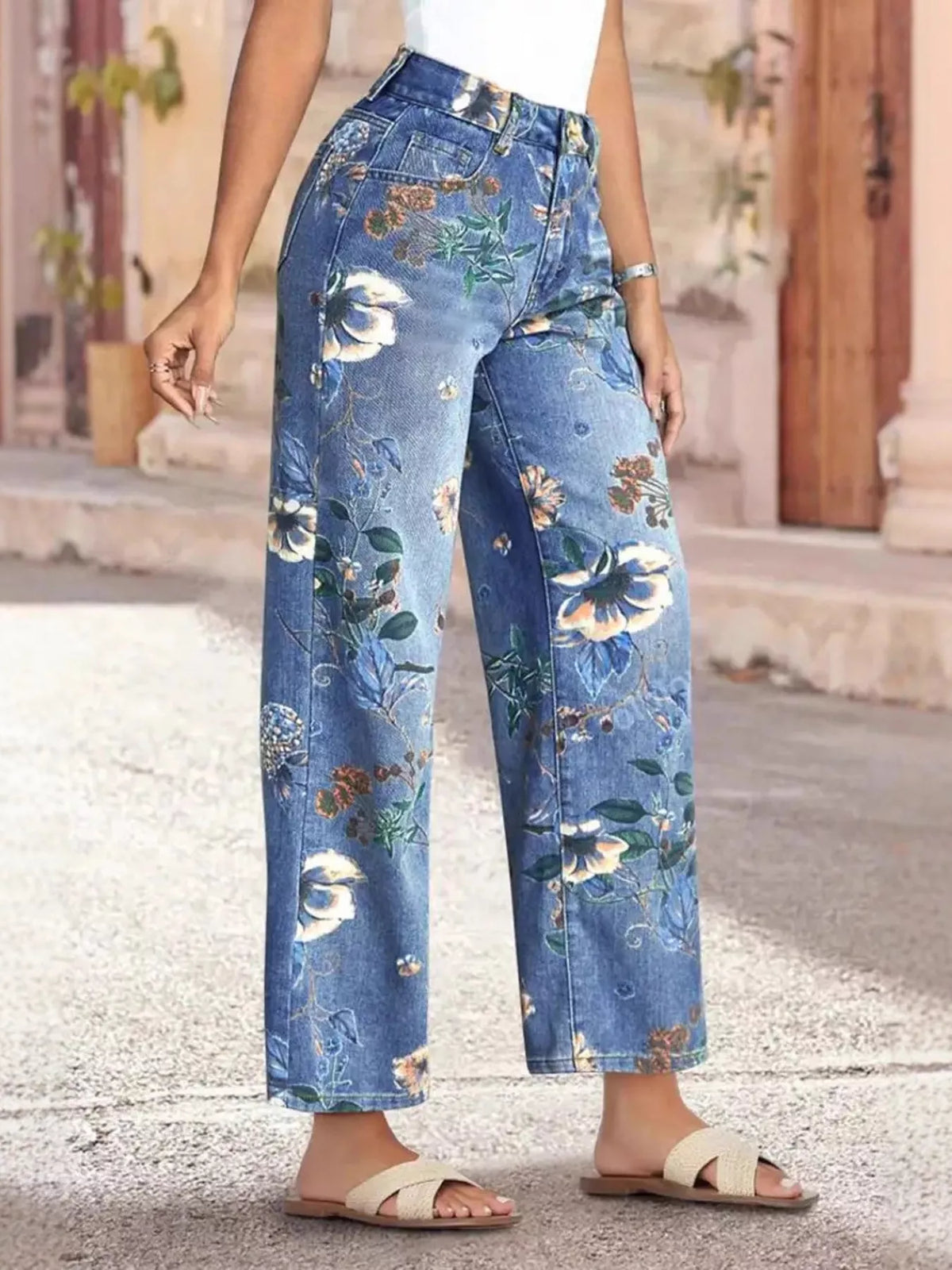 Floral print wide-leg jeans from Plush Fashion Hub featuring a relaxed fit and vibrant flower pattern.