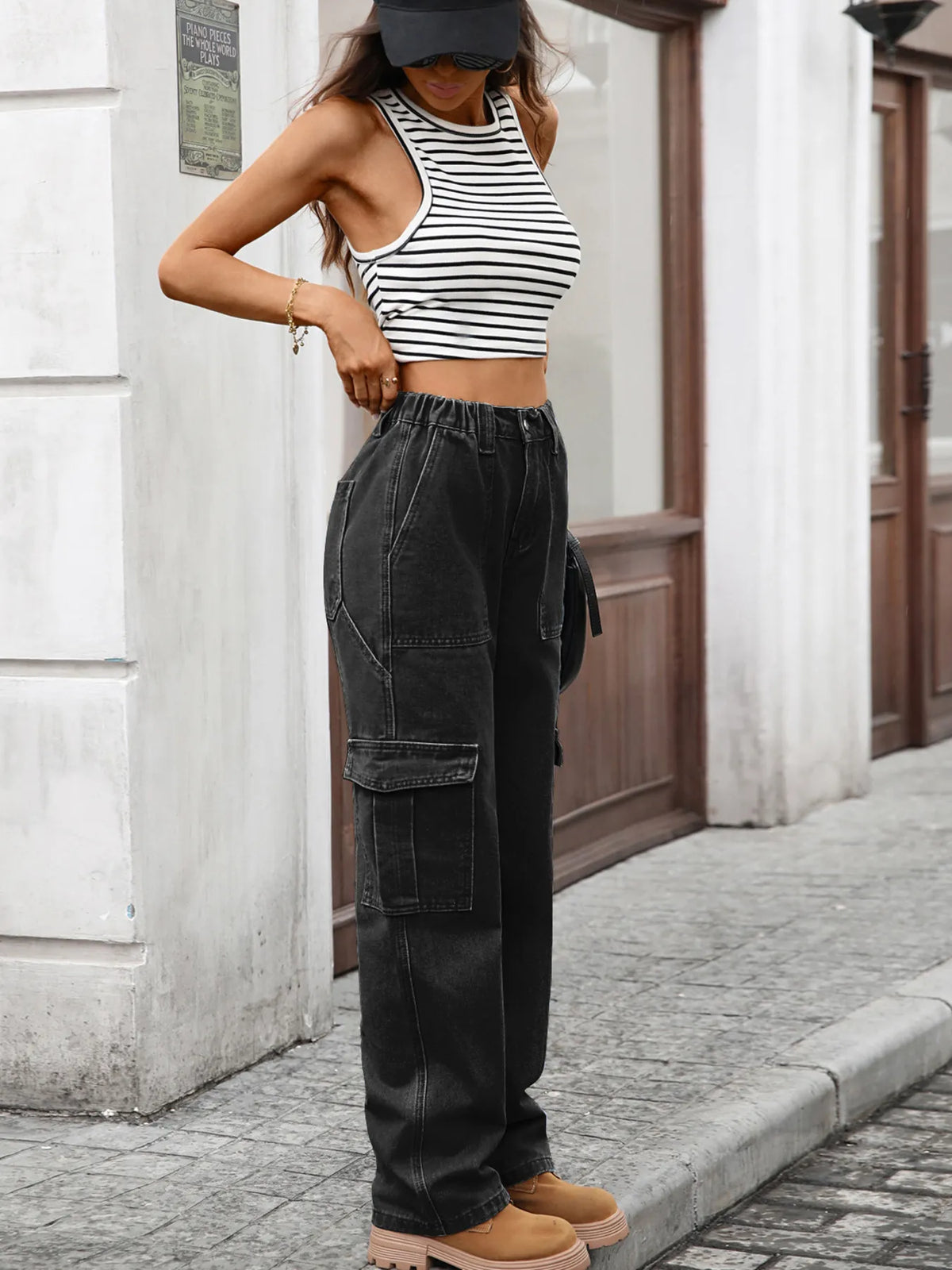High-waisted cargo denim jeans from Plush Fashion Hub featuring classic blue denim, multiple pockets, and a relaxed fit.