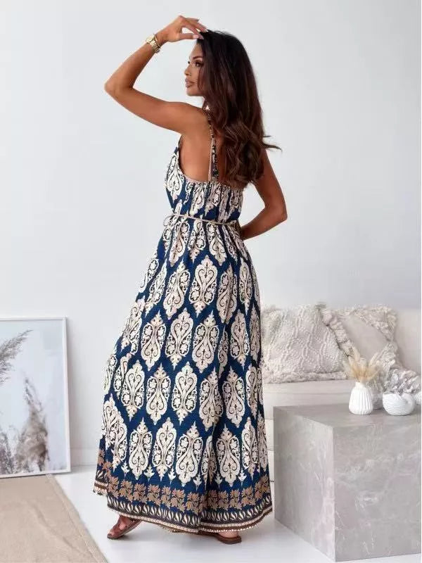 Printed spaghetti strap wide-leg jumpsuit from Plush Fashion Hub, featuring a stylish design and comfortable fit.