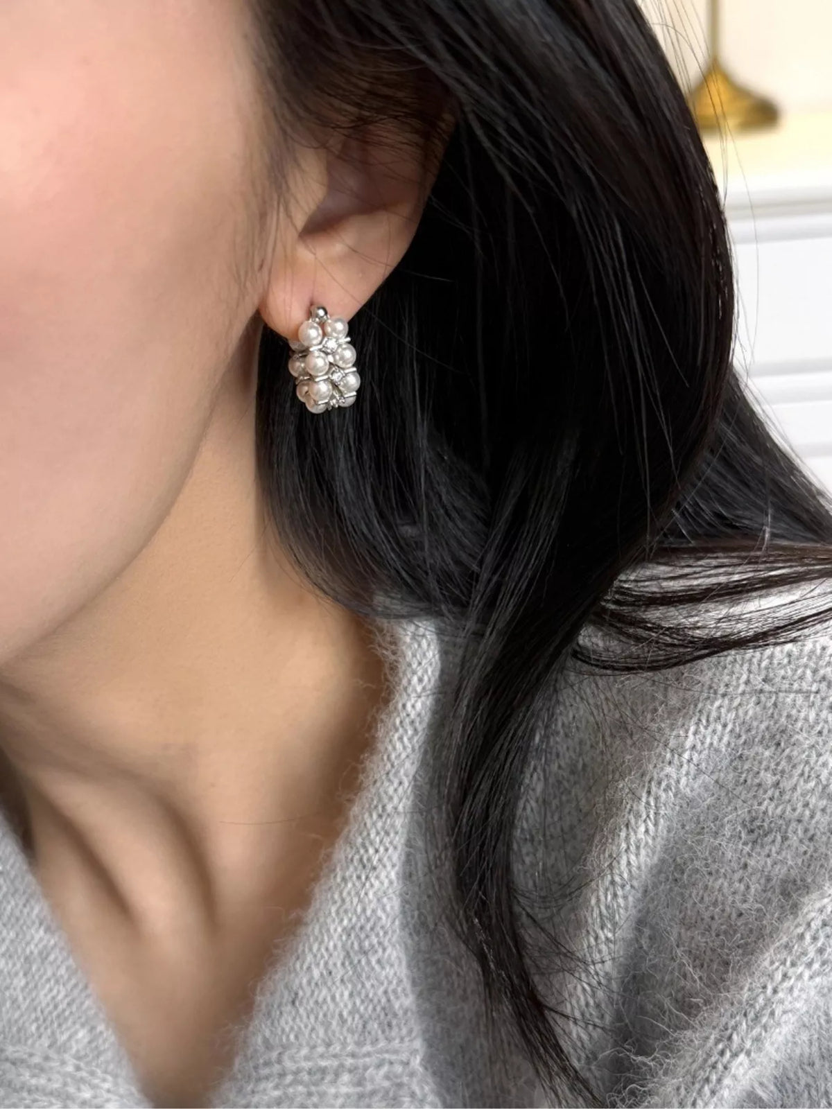 Pearl hoop earrings by Plush Fashion Hub featuring elegant white pearls on shiny gold hoops, perfect for stylish accessories.