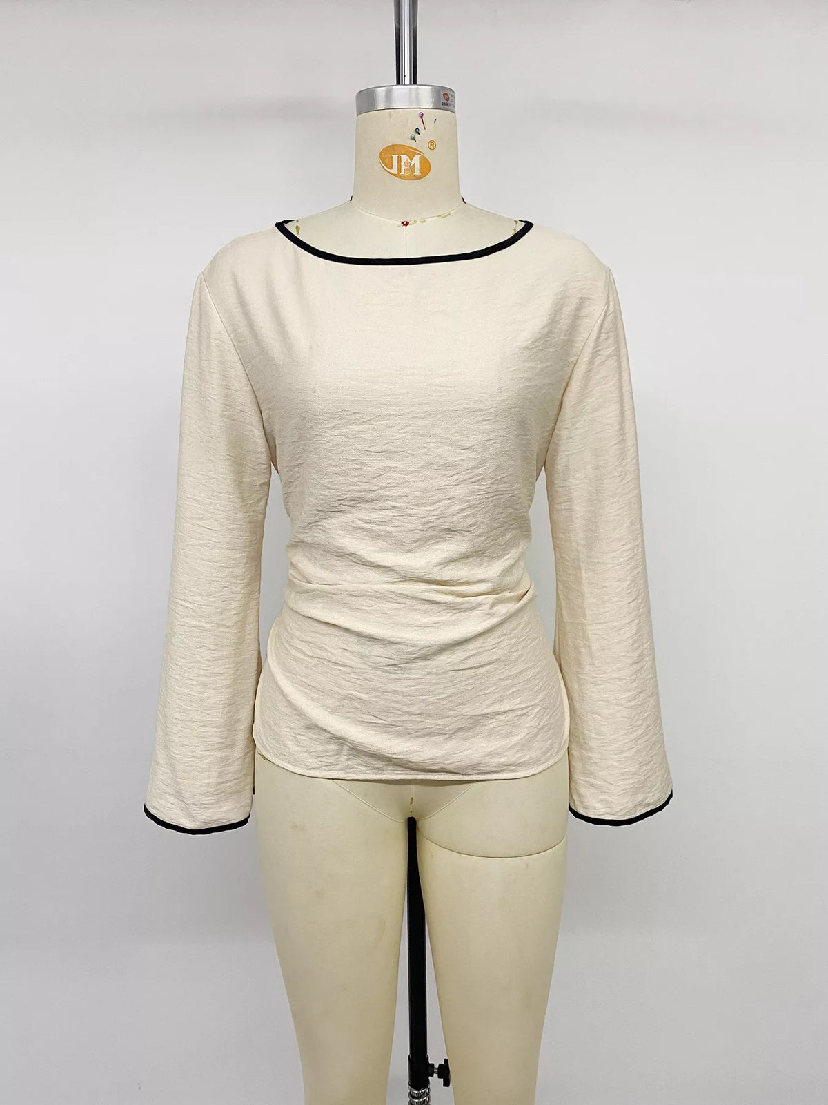 Contrast trim flare sleeve blouse by Plush Fashion Hub, featuring stylish flare sleeves and elegant design.