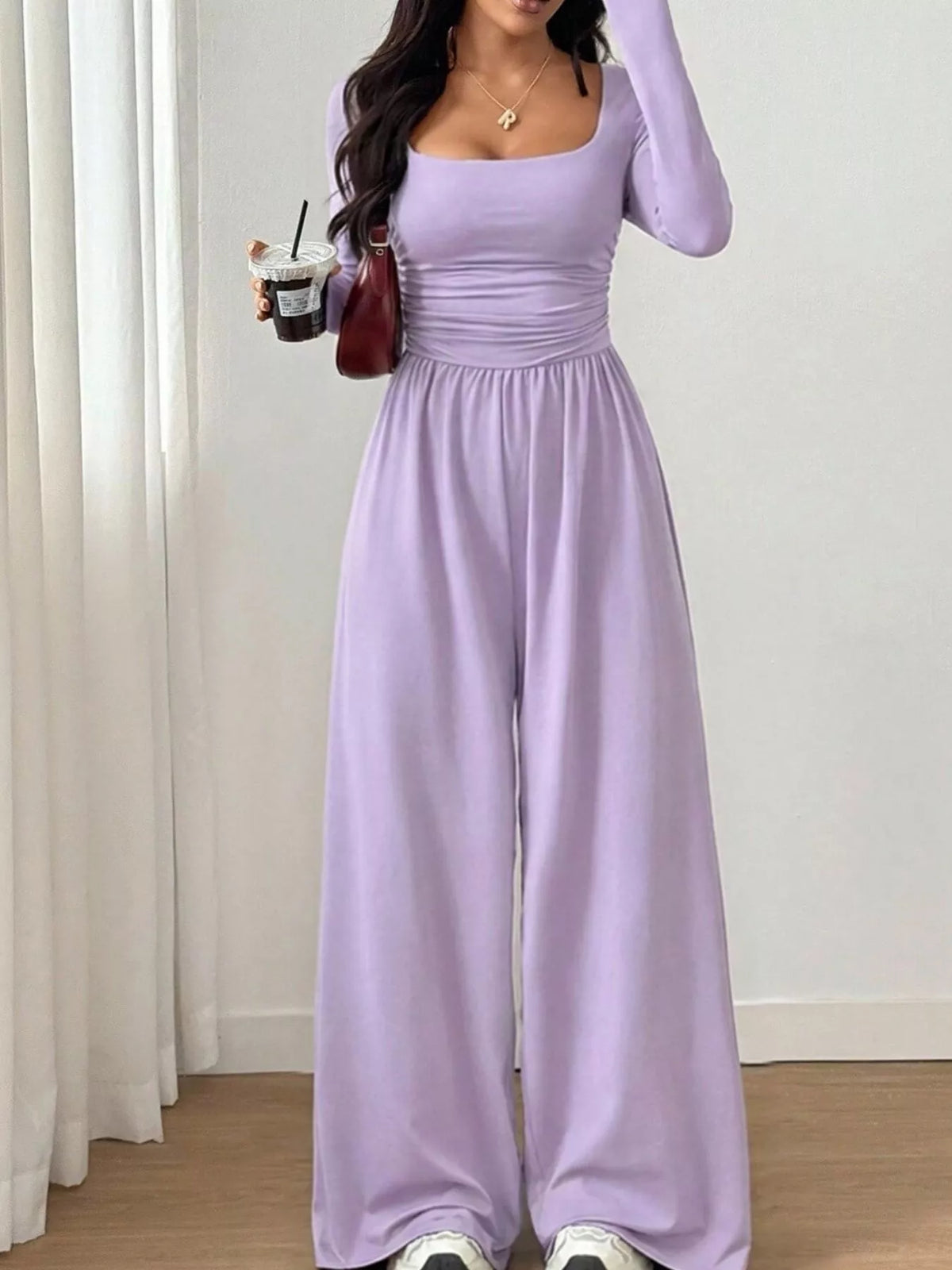 Trendsi ruched square neck wide-leg jumpsuit with sleeveless design and relaxed fit, displayed on a model.