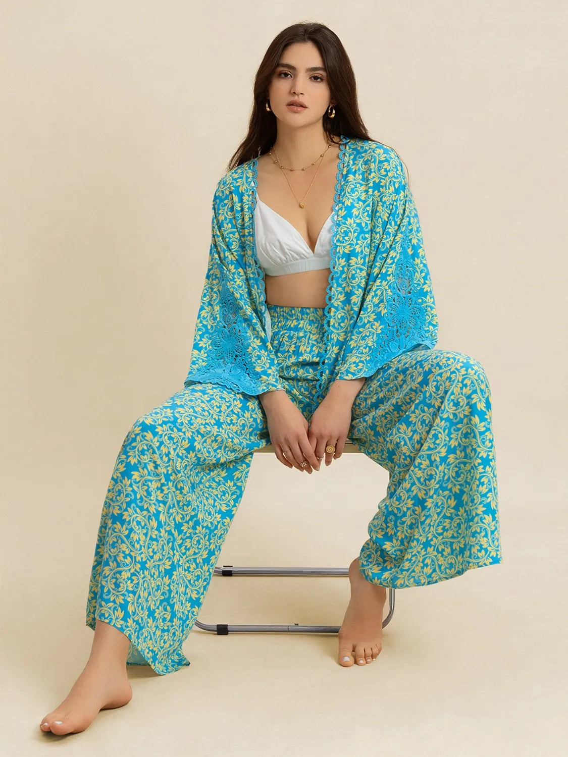 Open front printed matching top and pants set by Plush Fashion Hub, showcasing a stylish coordinated outfit with vibrant patterns.