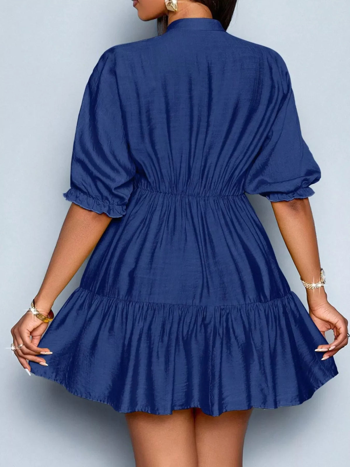 Notched half sleeve tiered dress by Plush Fashion Hub featuring a flowy design and layered fabric in a stylish, casual look.