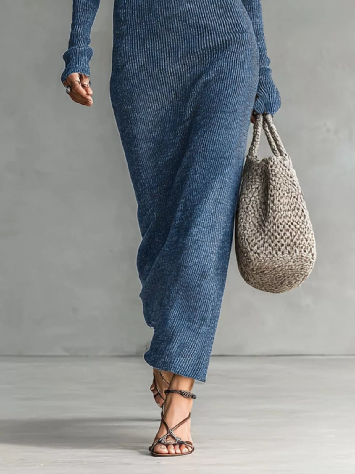 Knit hooded maxi dress by Trendsi featuring button placket and pockets, shown with a relaxed fit and cozy fabric.