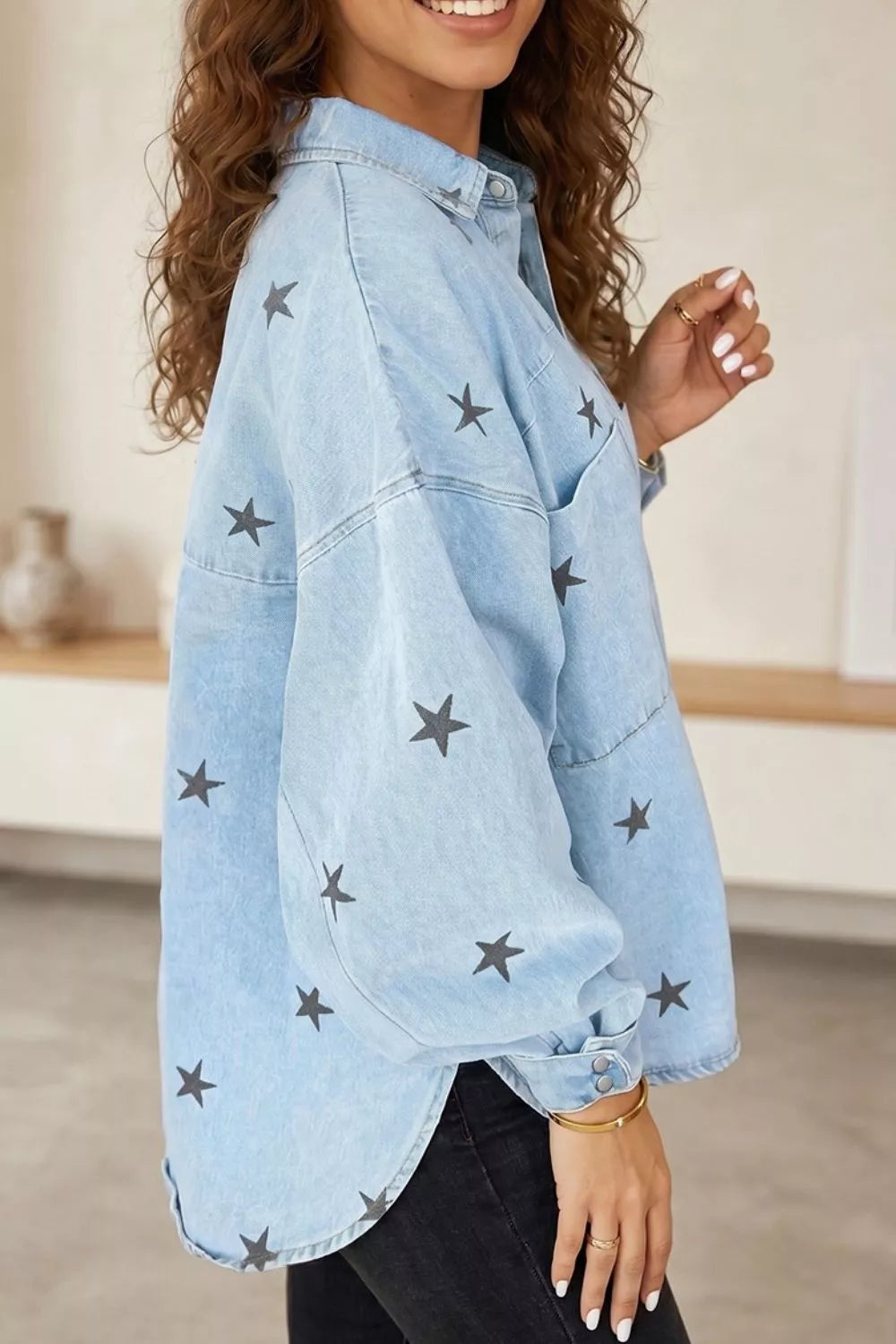 Light wash denim jacket for women with star print, trendy Trendsi jacket, casual outerwear with front pockets and button closure.