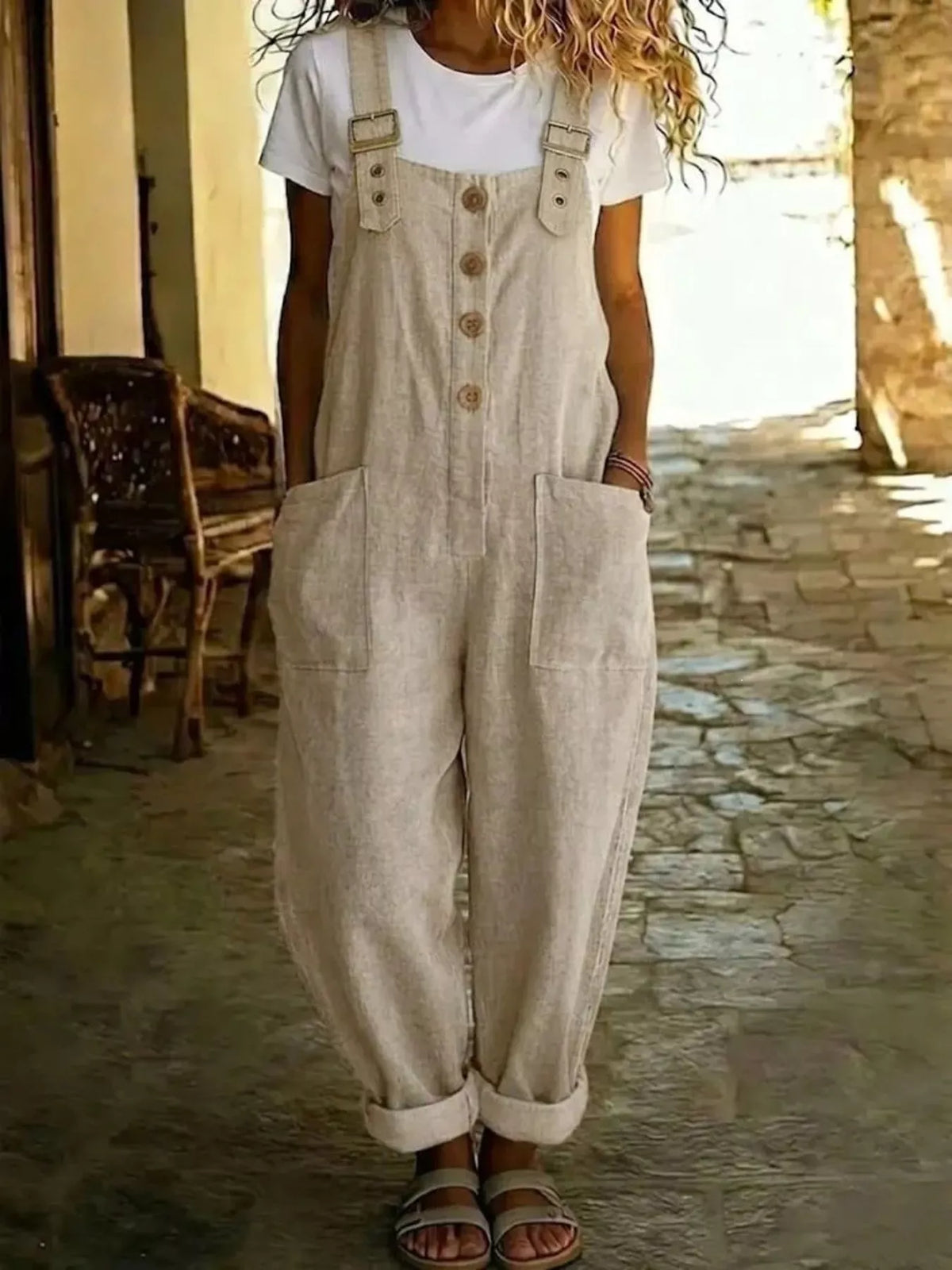 Casual button-front wide-leg overalls by Plush Fashion Hub featuring a relaxed fit and classic denim style.