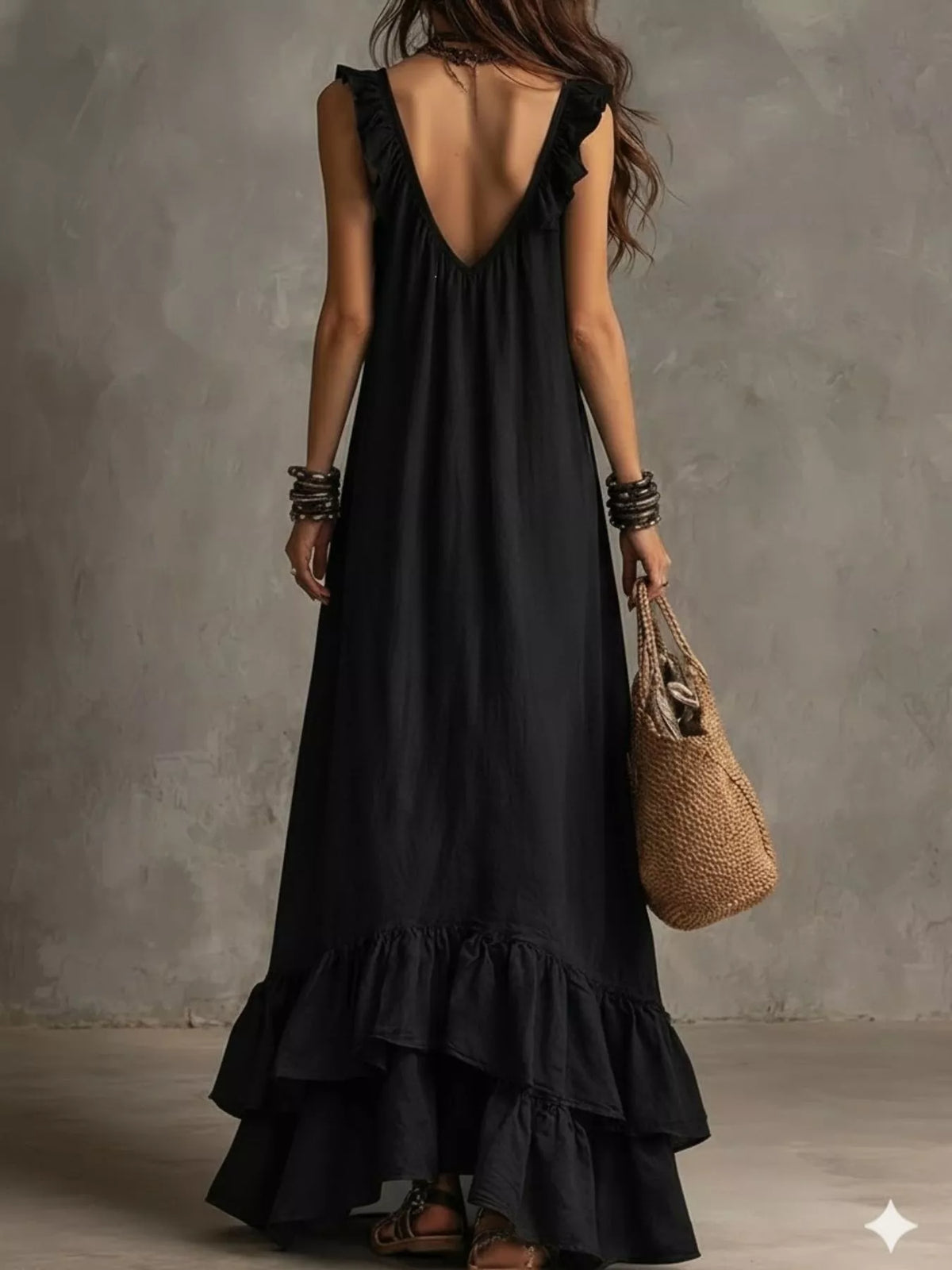 Plush Fashion Hub ruffled sleeveless maxi dress with flowing fabric and elegant design, perfect for summer or special occasions.