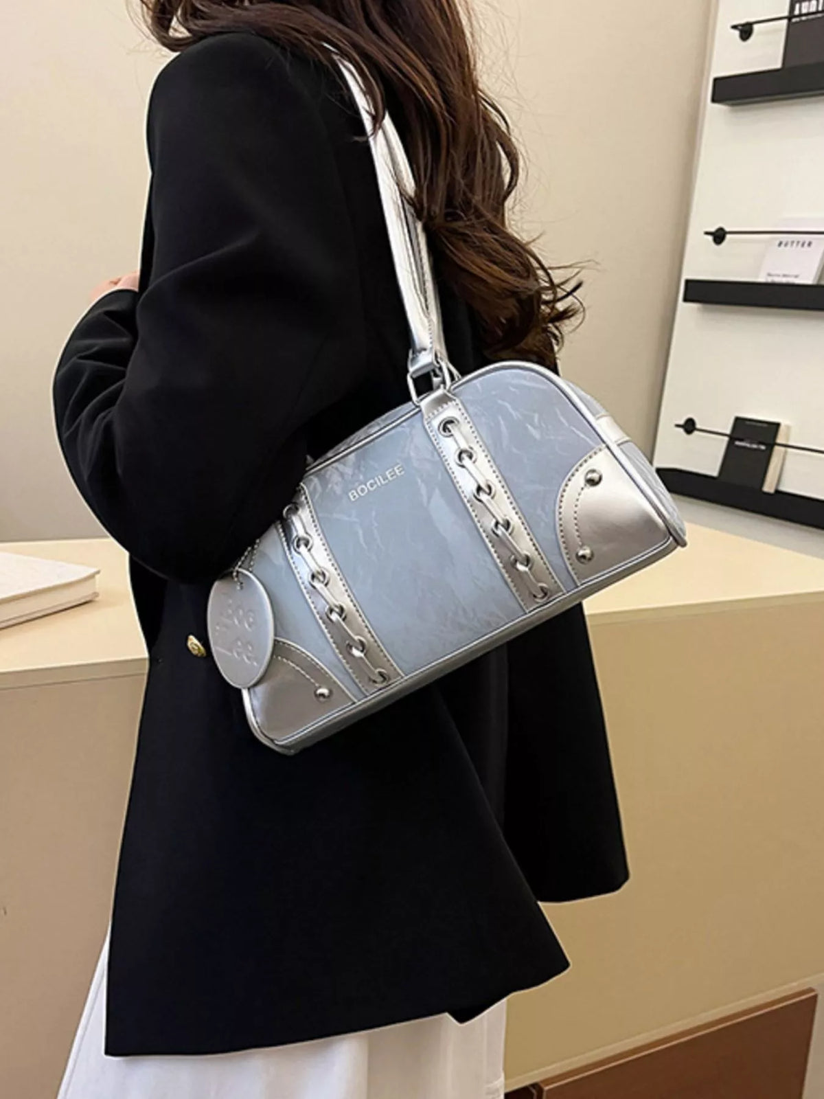 Plush Fashion Hub top handle shoulder bag featuring a sleek design, leather strap, and spacious interior for everyday use.