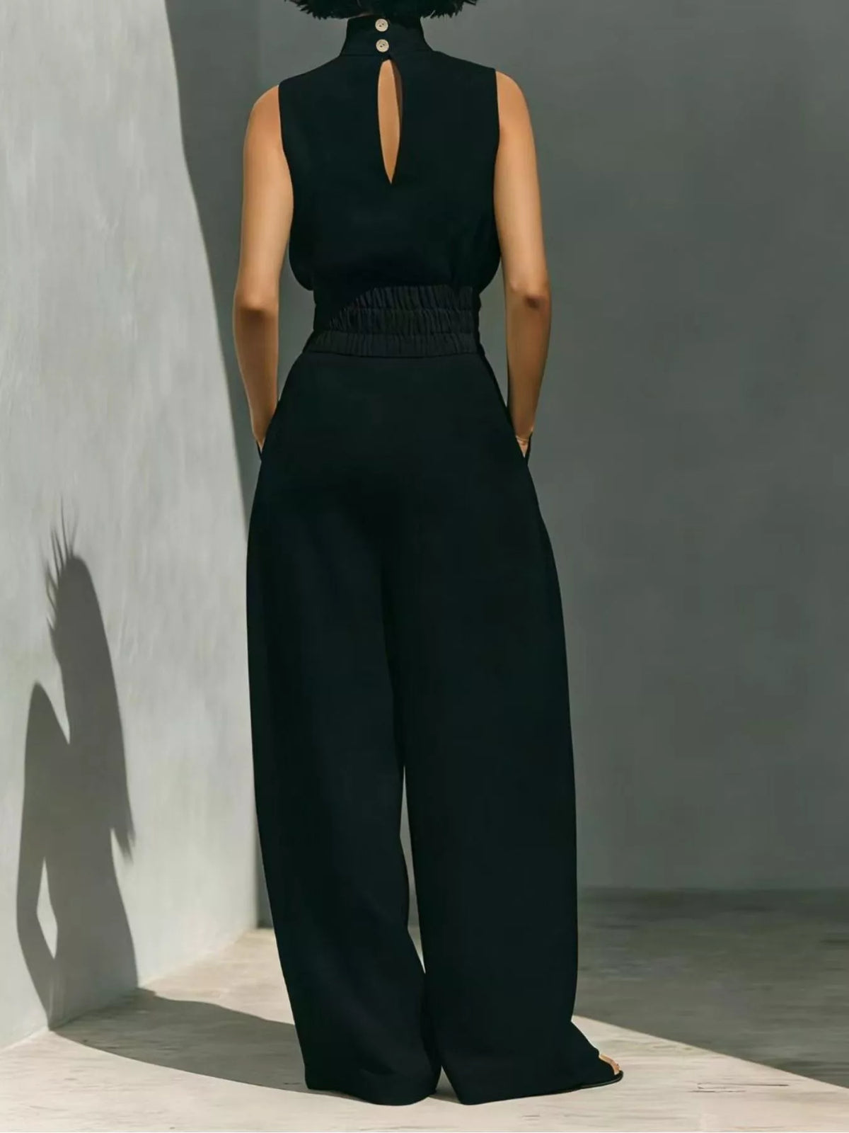 Plush Fashion Hub sleeveless turtleneck top and wide-leg pants set in soft fabric, shown on a model.