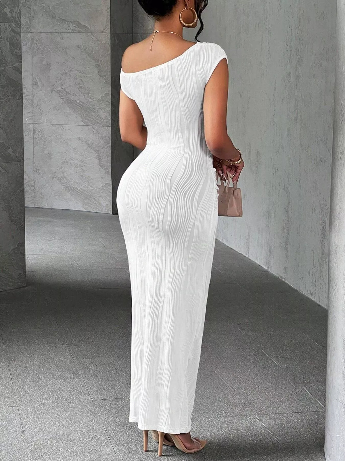 Textured one-shoulder maxi dress by Plush Fashion Hub, flowing fabric, elegant design, and stylish silhouette.