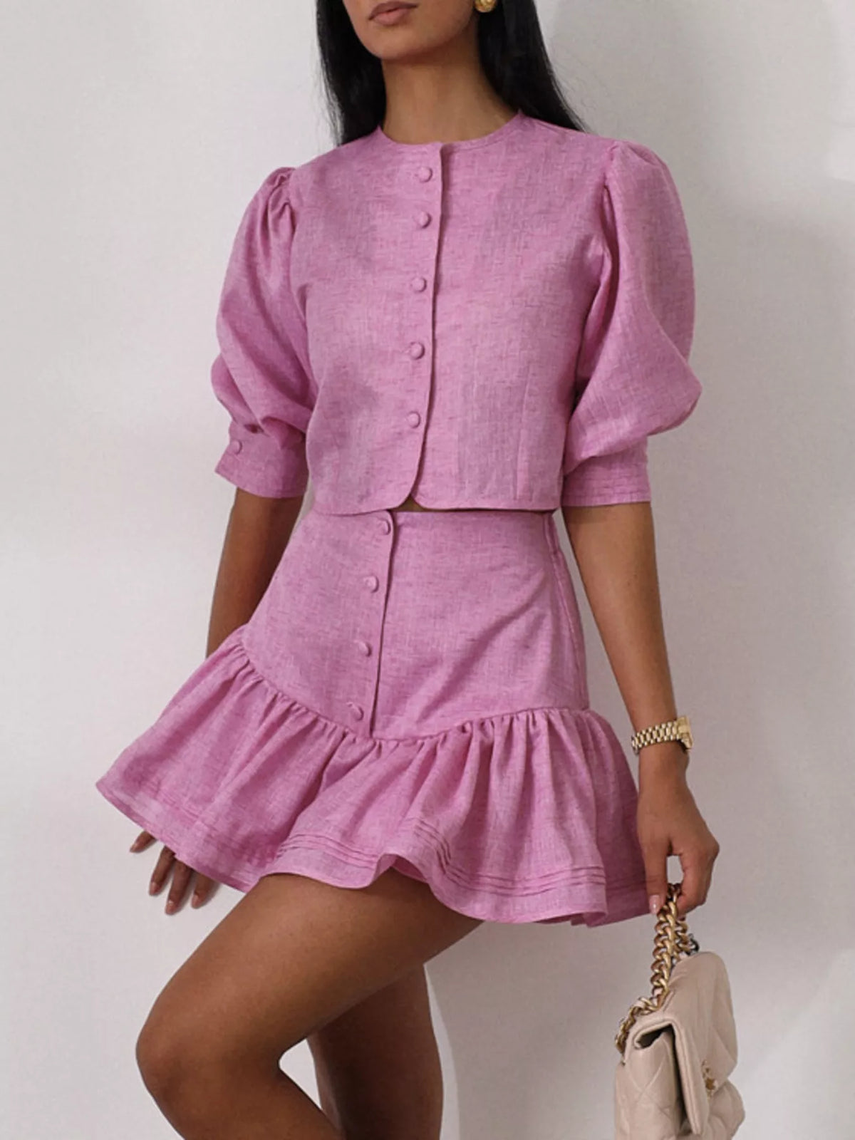 Plush Fashion Hub puff sleeve cropped top and ruffled skirt set with stylish, feminine design, perfect for casual or semi-formal wear.