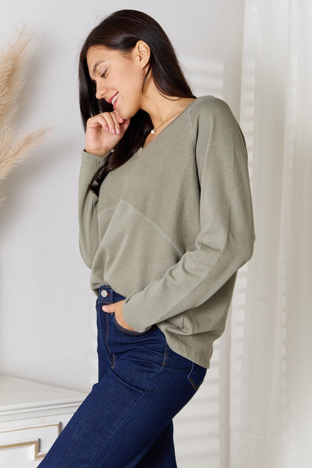 Women’s V-neck long sleeve cotton blend T-shirt by Plush Fashion Hub, showcasing a classic fit and soft fabric.