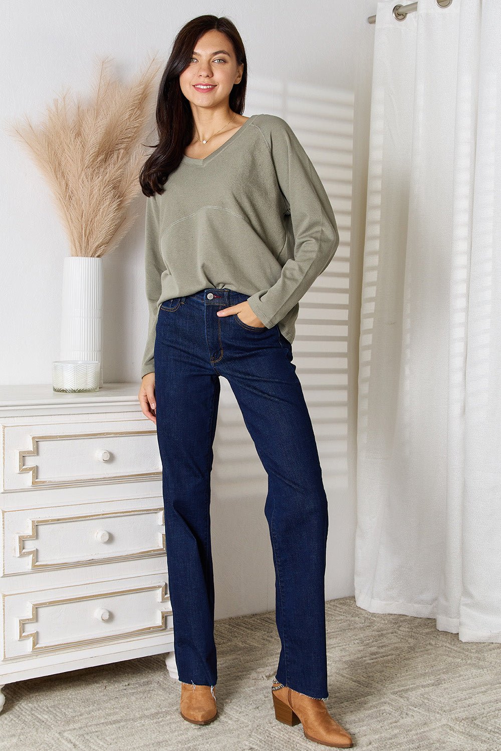 Women’s V-neck long sleeve cotton blend T-shirt by Plush Fashion Hub, featuring a classic fit and comfortable fabric.